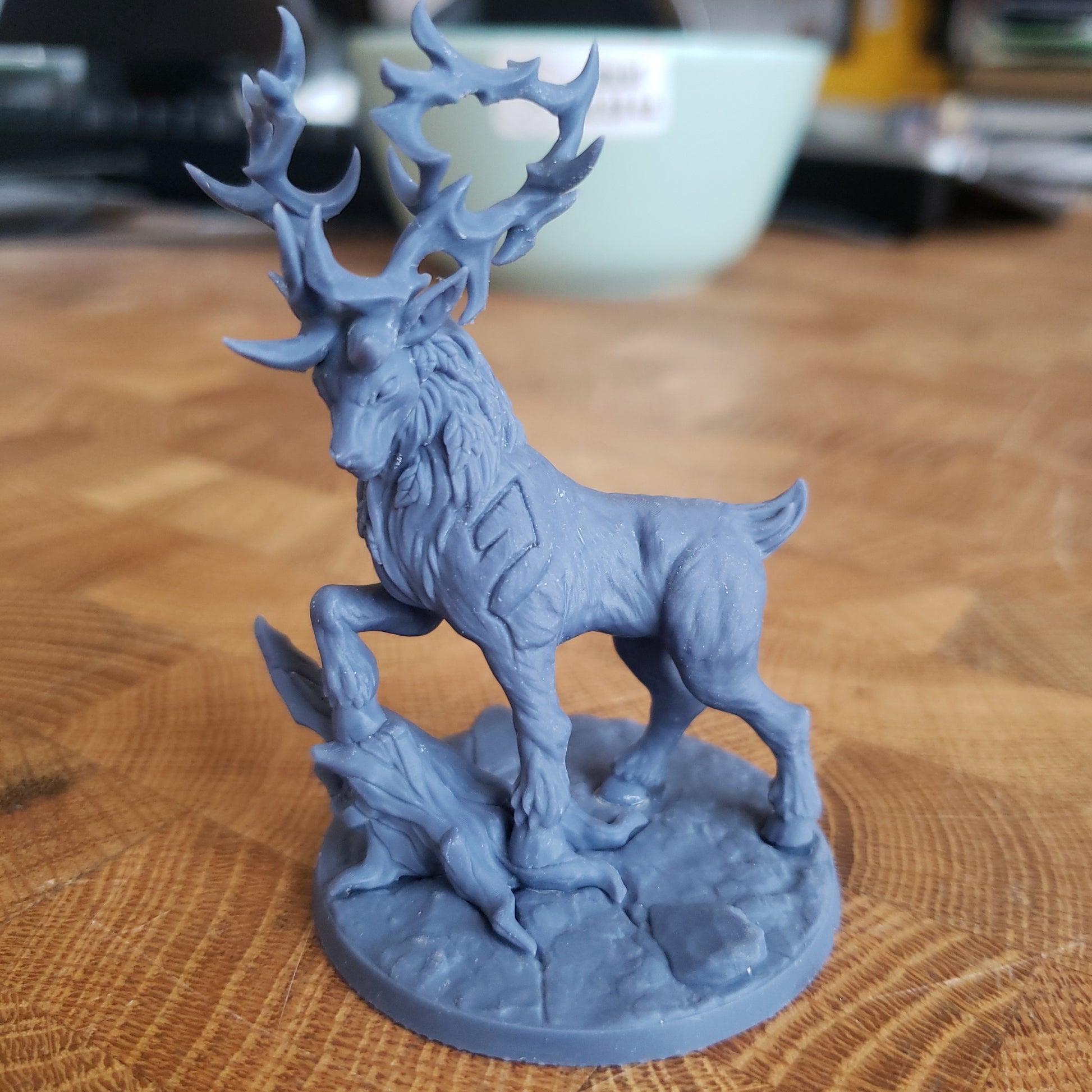 Image shows an example of a 3D printed wild stag gaming miniature printed in-house at All Systems Go