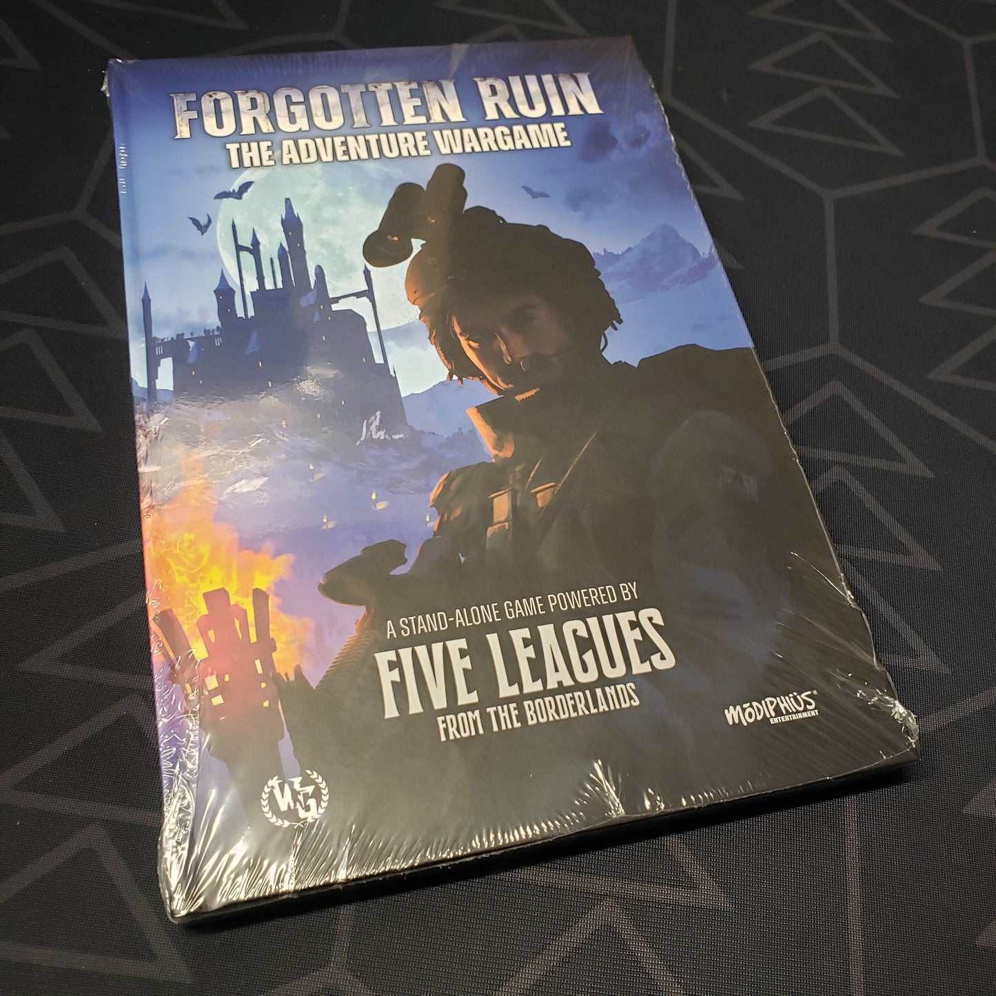 Image shows the front cover of the Forgotten Ruin: The Adventure Wargame wargaming book