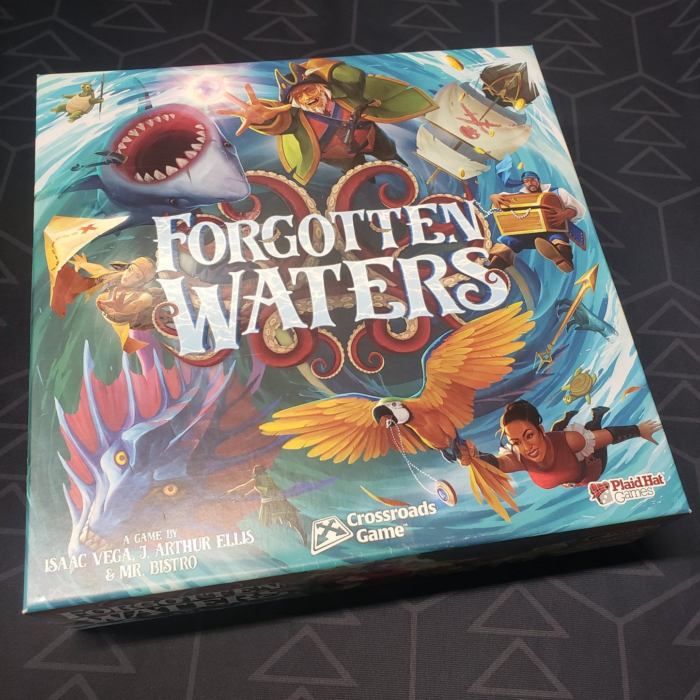 Image shows the front cover of the box of the Forgotten Waters board game