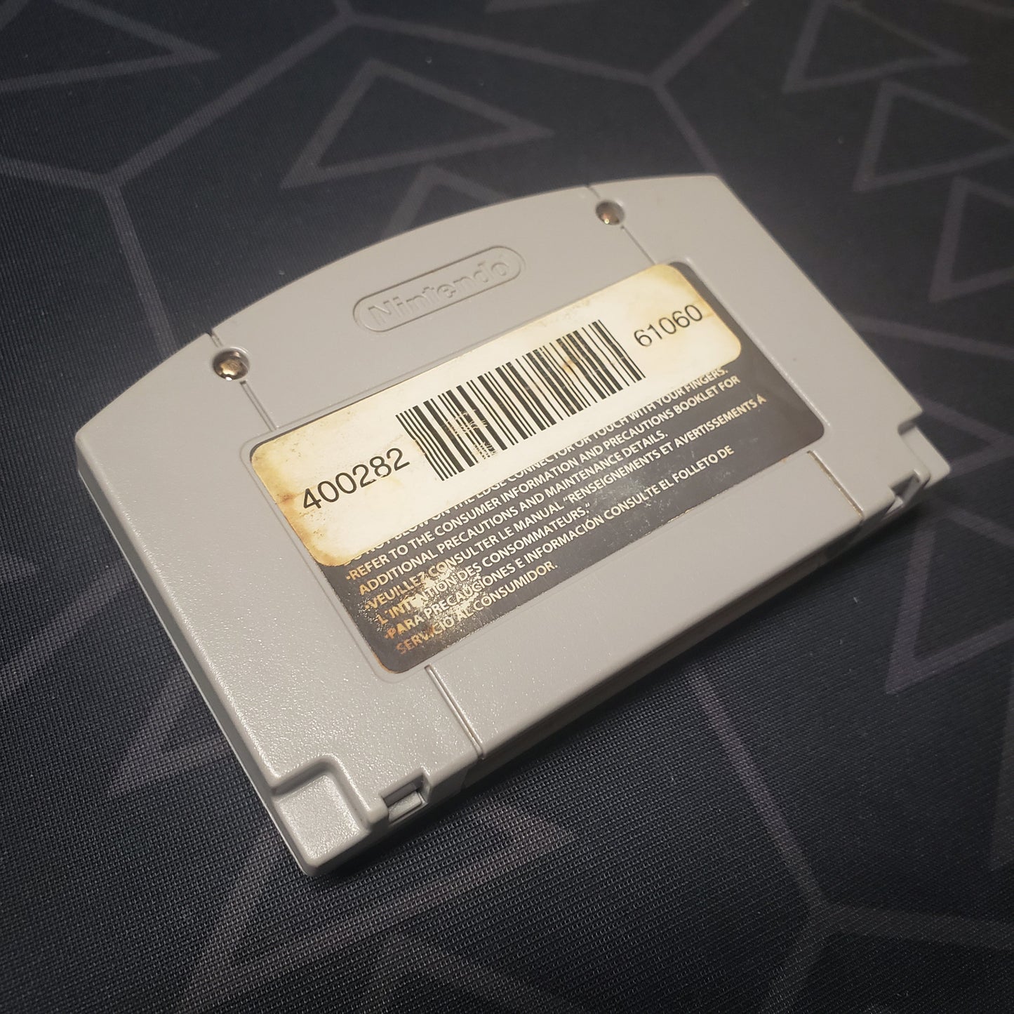 Image shows the back of the cartridge for the video game Fox Sports College Hoops '99 for the Nintendo 64
