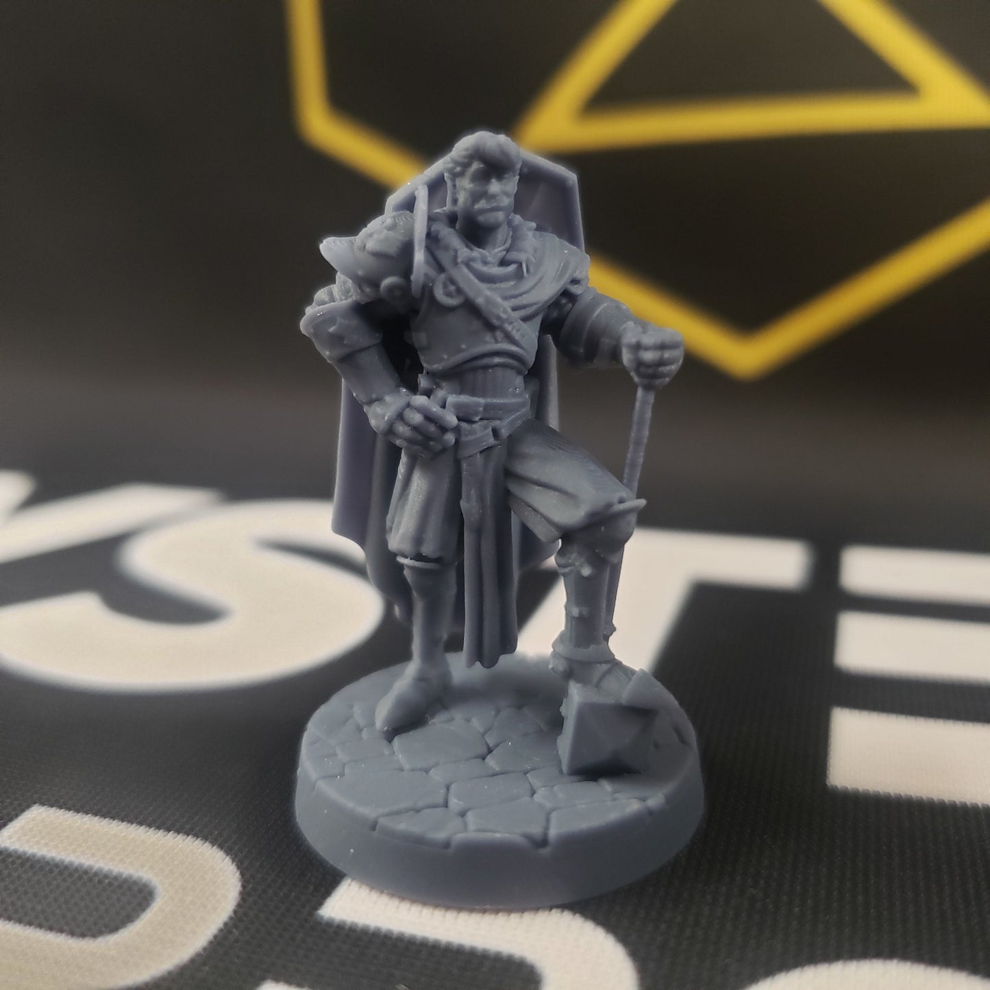 Image shows a 3D printed half-orc paladin gaming miniature