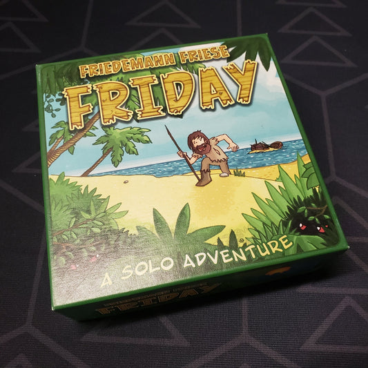 Image shows the front cover of the box of the Friday board game
