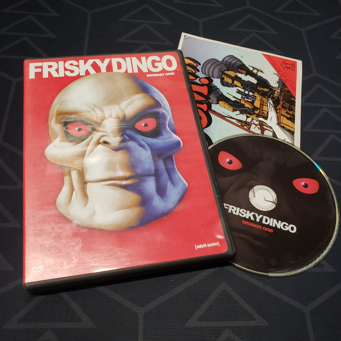 Image shows the case, insert & disc for the first season of Frisky Dingo on DVD