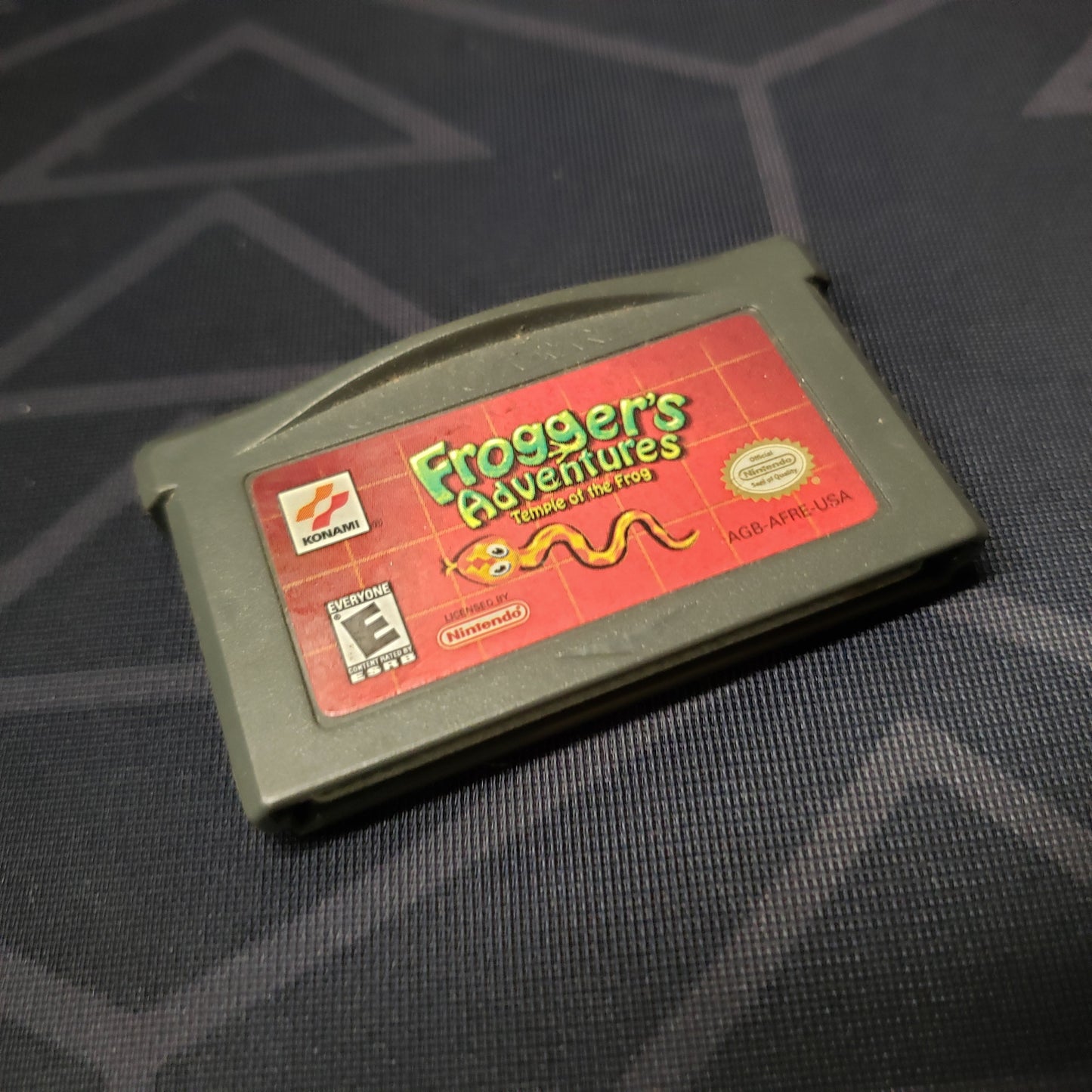 Image shows the front of the cartridge for the video game Frogger's Adventures: Temple of the Frog for Nintendo Game Boy Advance