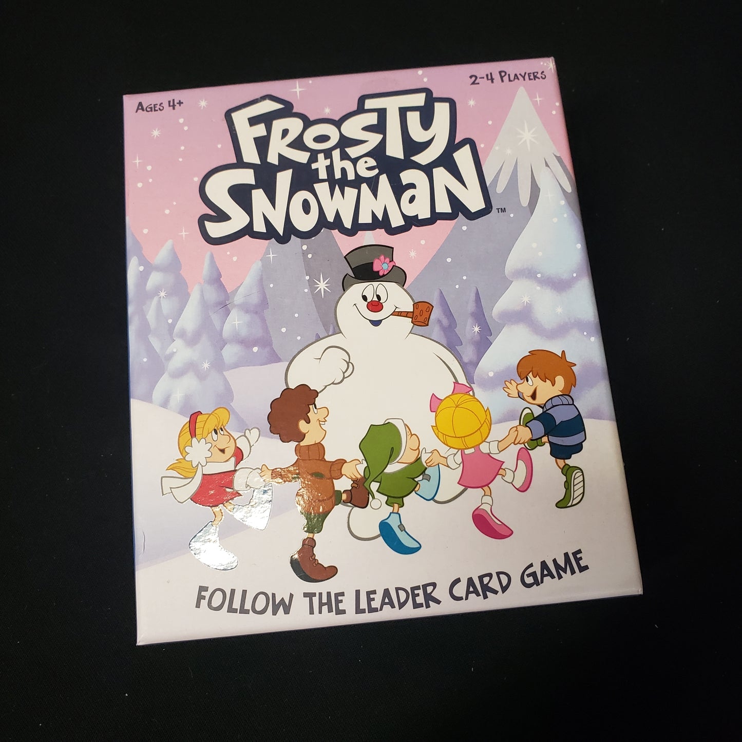 Image shows the front cover of the box of the Frosty the Snowman: Follow the Leader card game