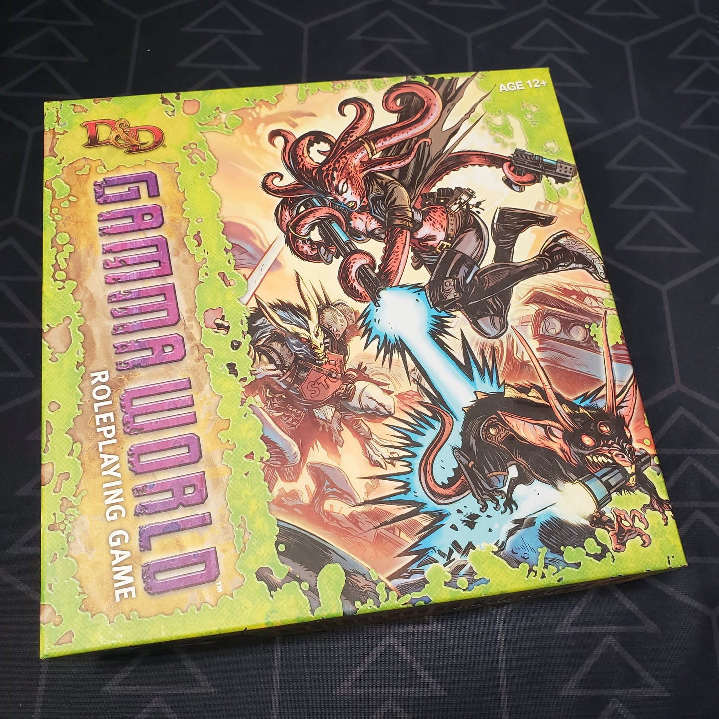 Image shows the front cover of the 7th Edition Box Set for the roleplaying game Gamma World