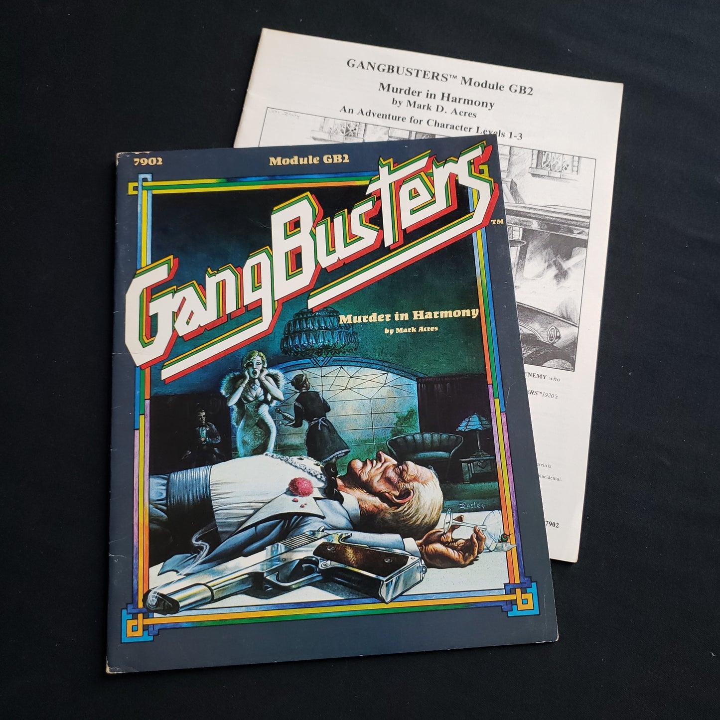 Image shows the front cover & front page of module of the Murder in Harmony book for the GangBusters roleplaying game