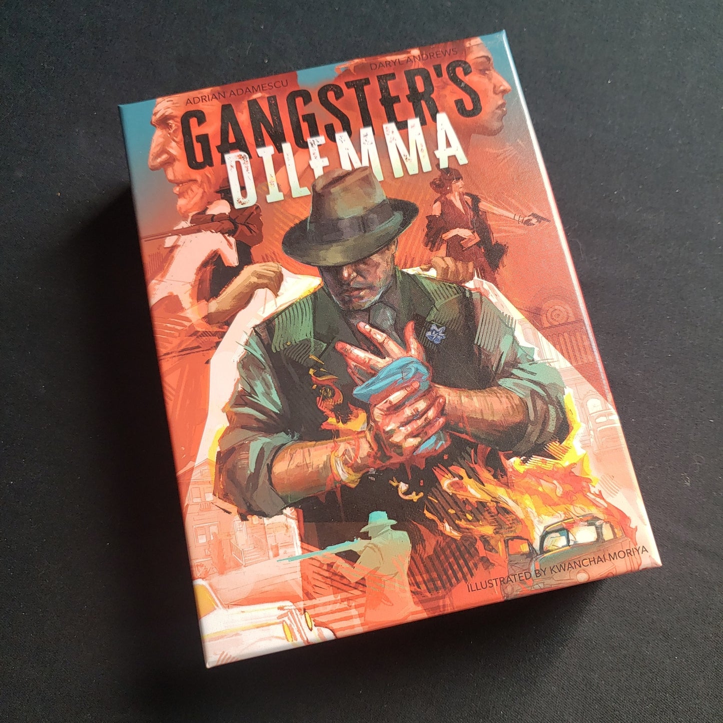 Image shows the front cover of the box of the Gangster's Dilemma card game