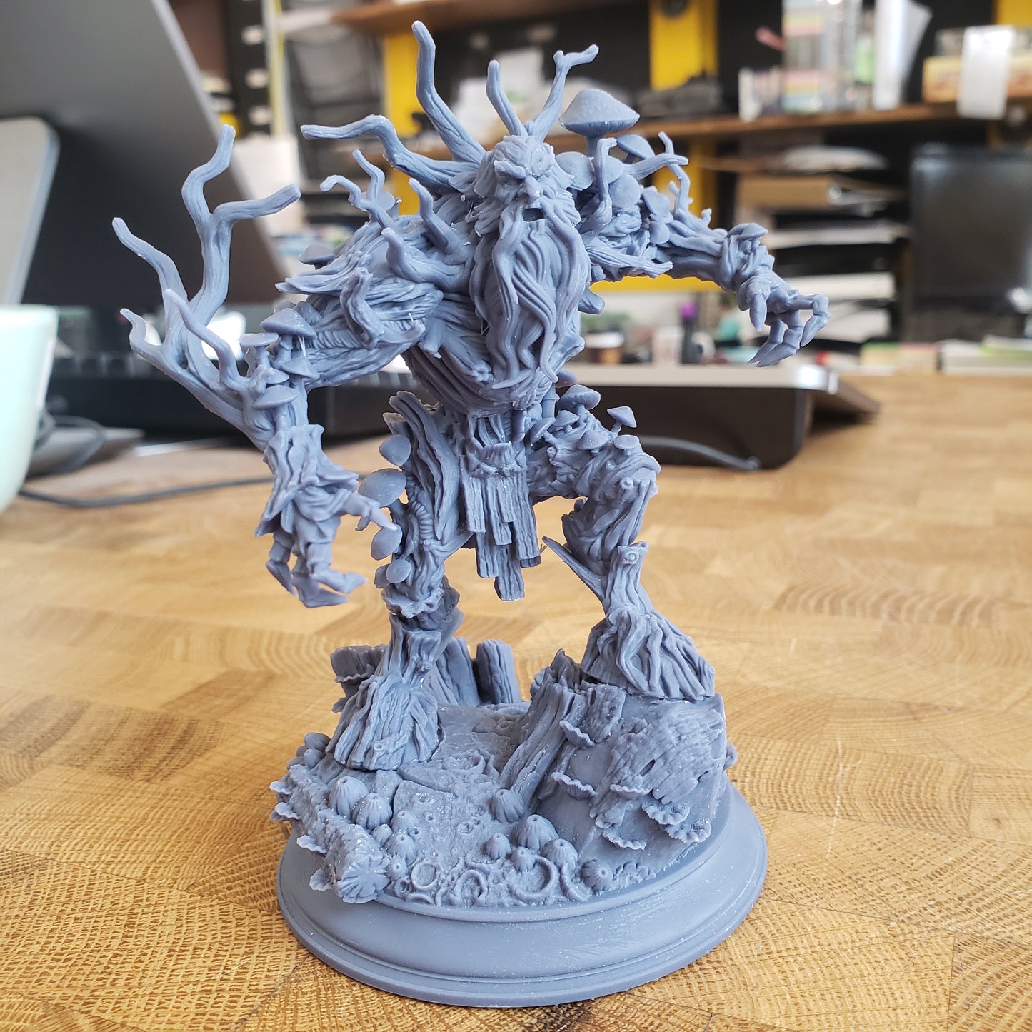 Image is a photo of a 3D printed corrupted treant gaming miniature printed in-house at All Systems Go