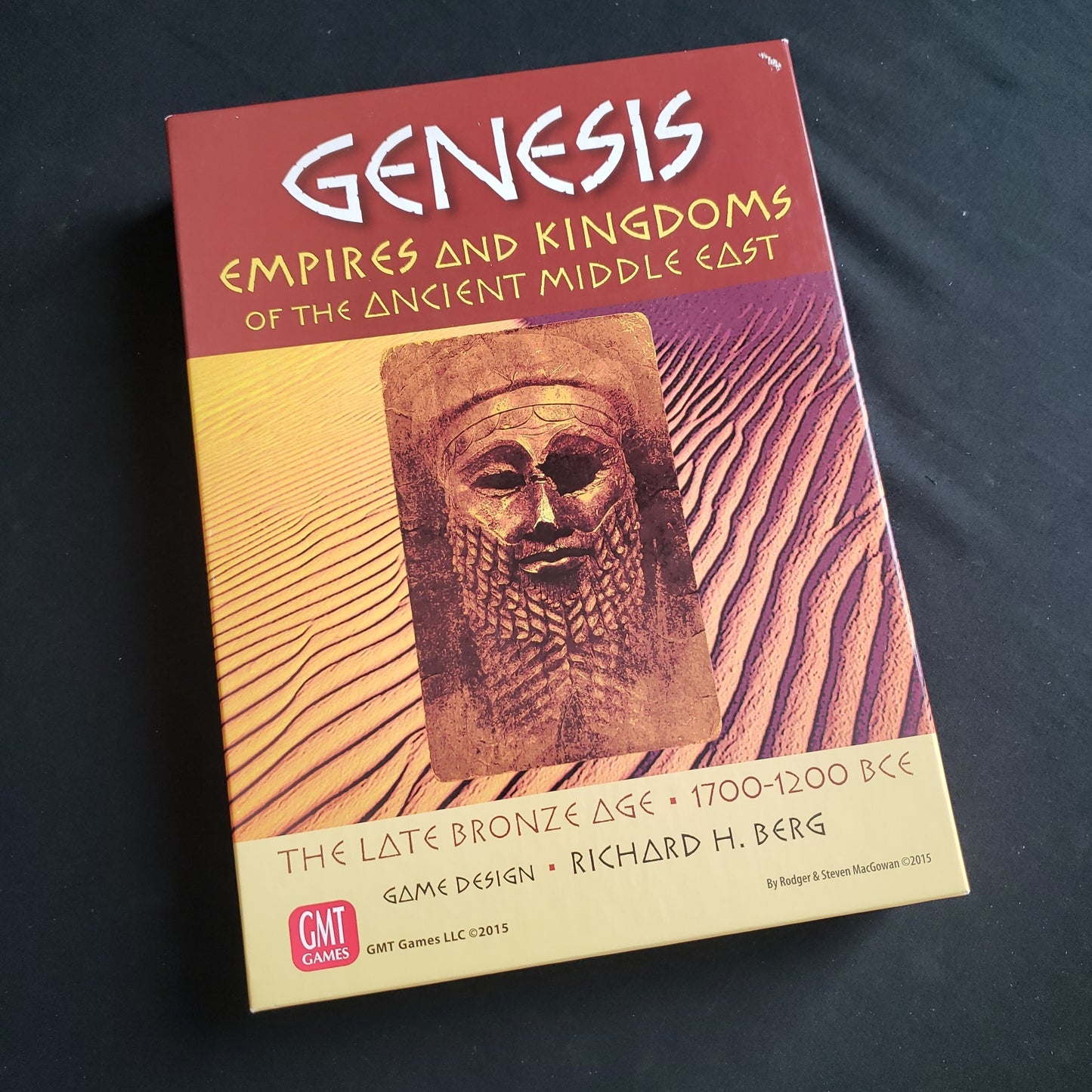 Image shows the front cover of the box of the Genesis board game