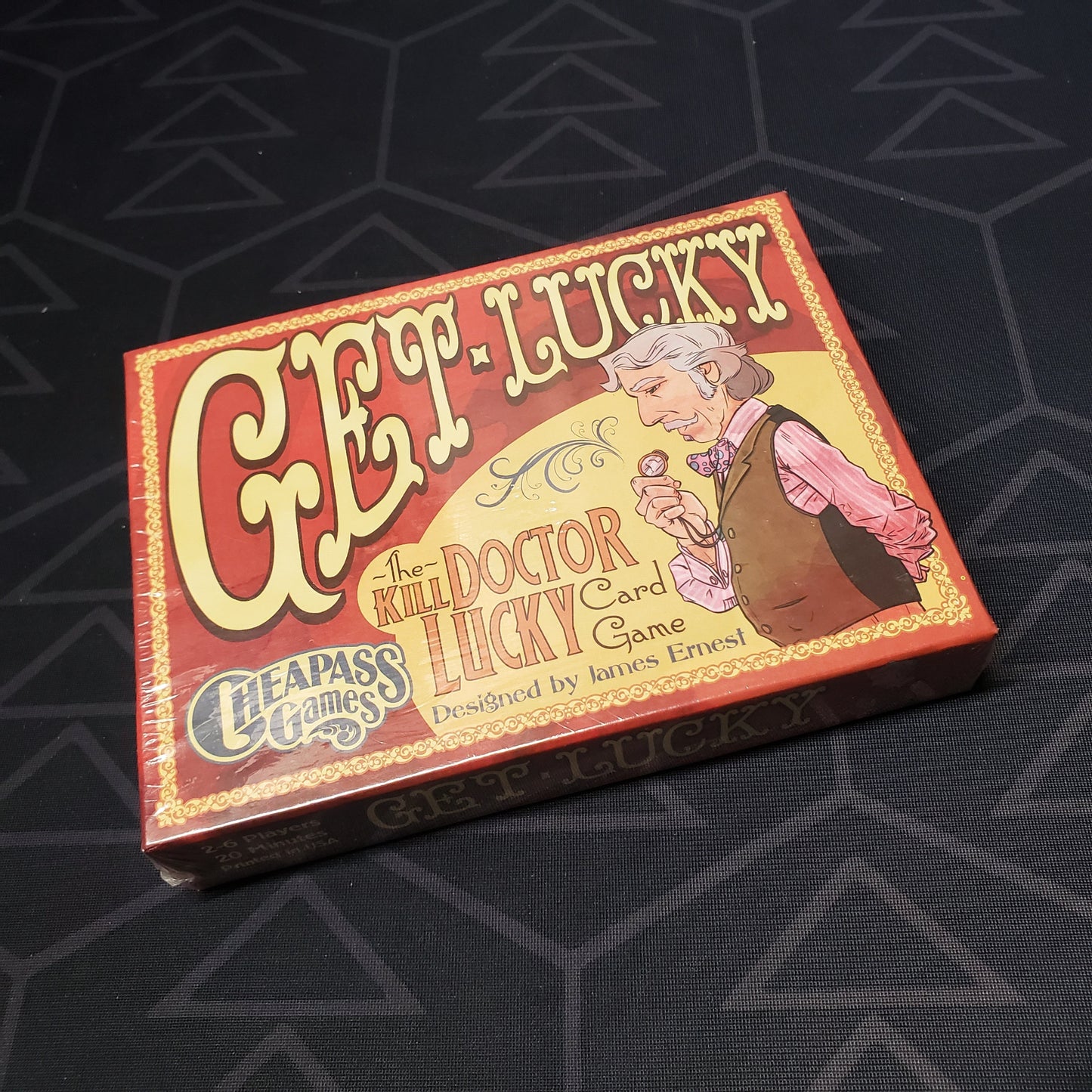 Image shows the front cover of the box for the Get Lucky card game