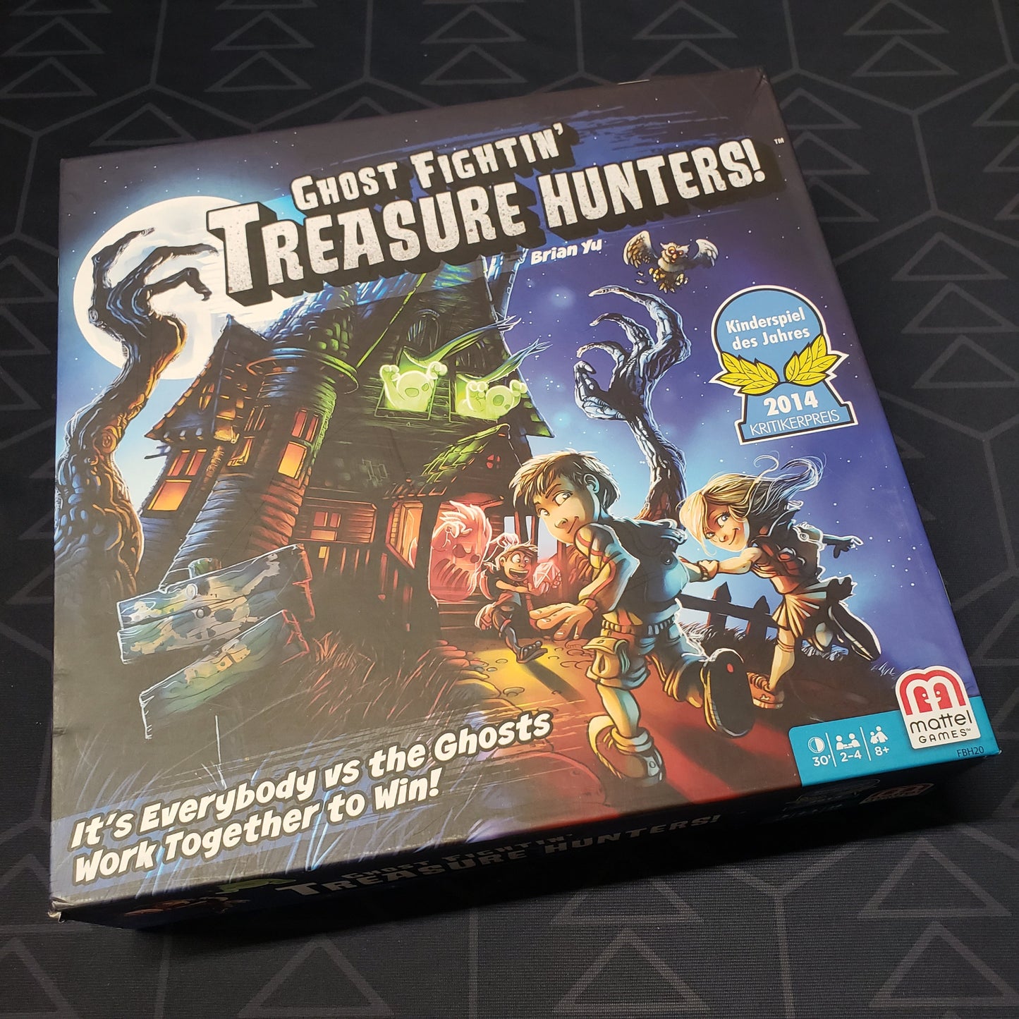 Image shows the front cover of the box of the Ghost Fightin' Treasure Hunters board game