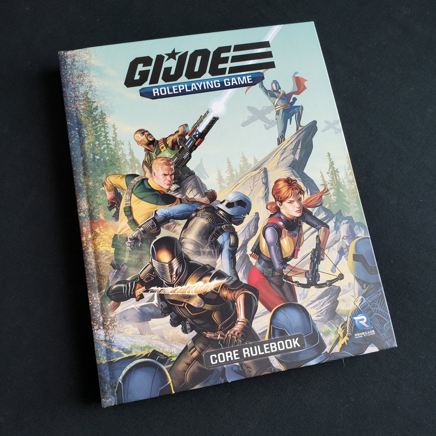 Image shows the front cover of the core rulebook for the G.I. JOE roleplaying game