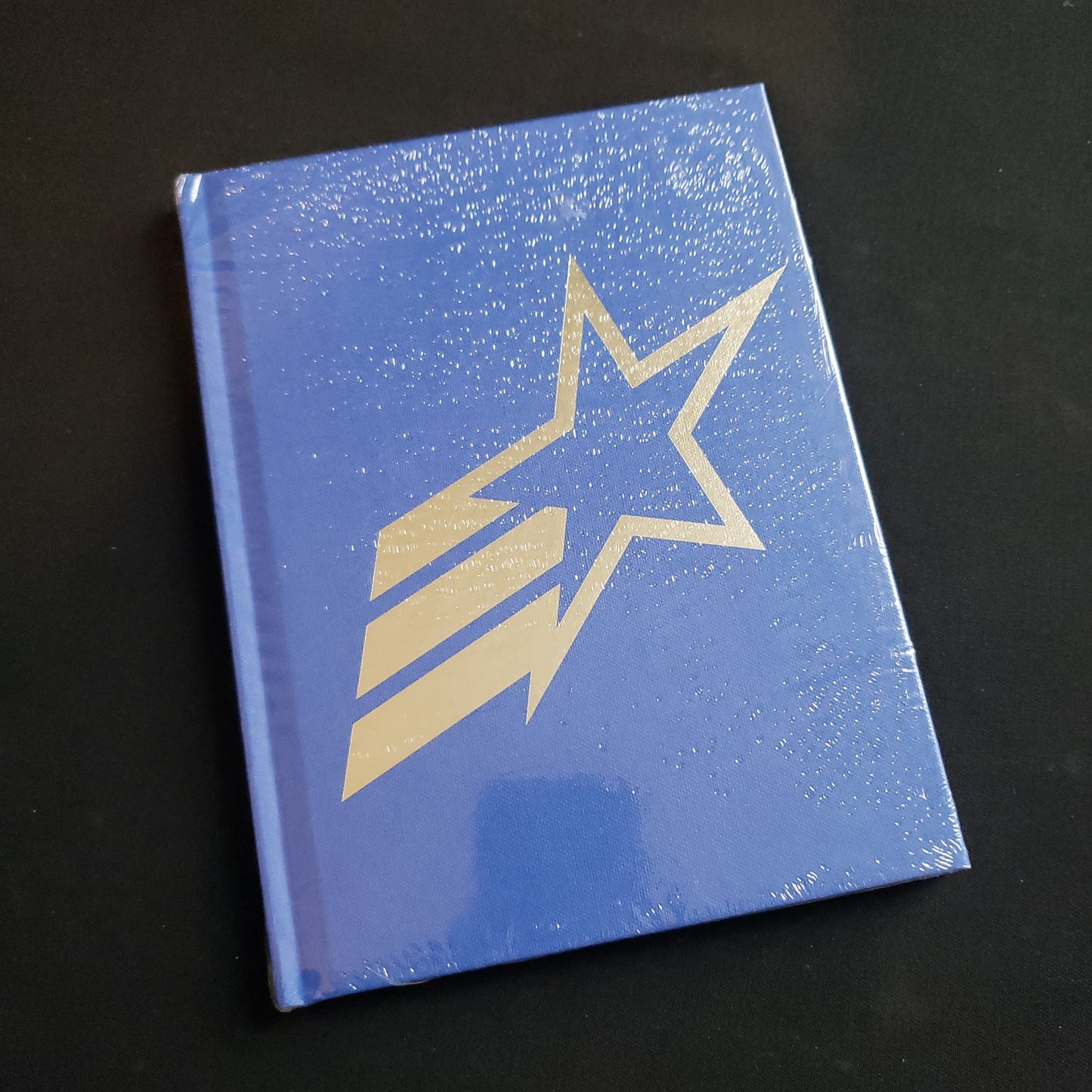 Image shows the front cover of the Expanded Character Journal book for the GI JOE roleplaying game