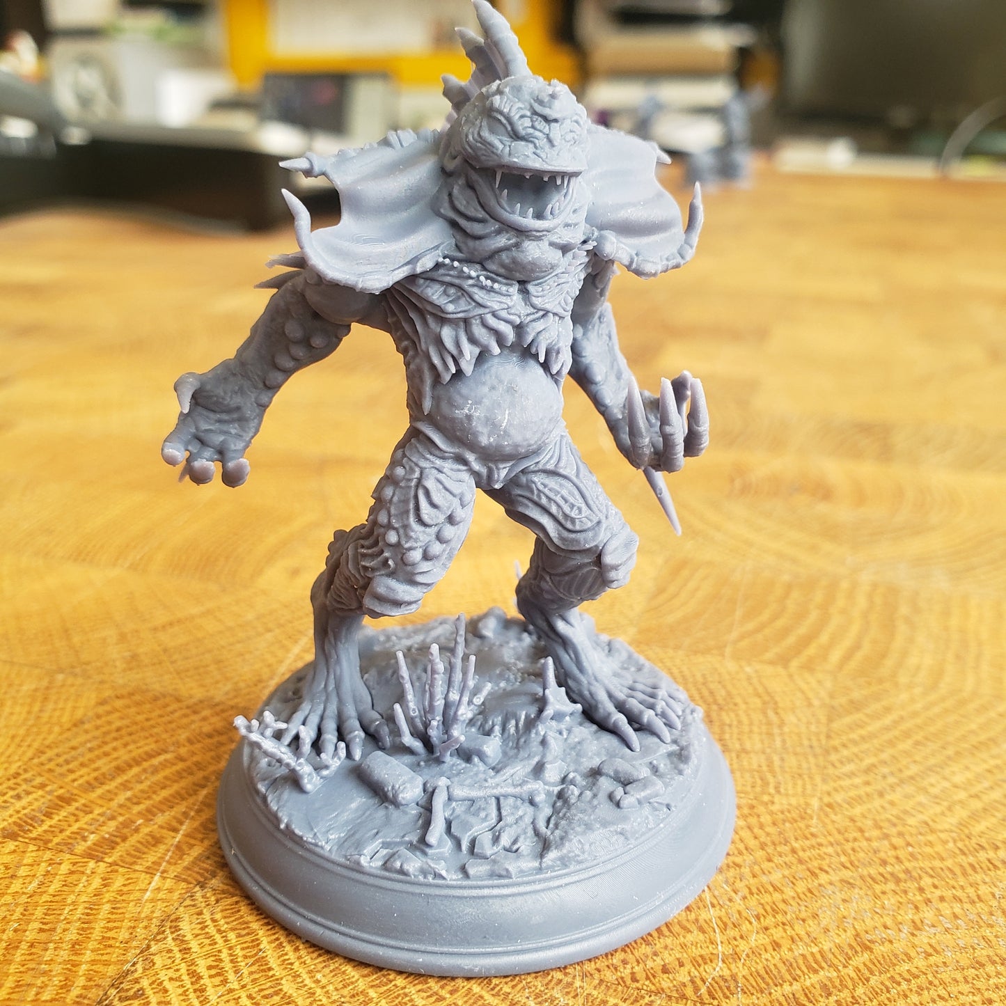 Image shows an example of a 3D printed fishfolk horror gaming miniature printed in-house at All Systems Go