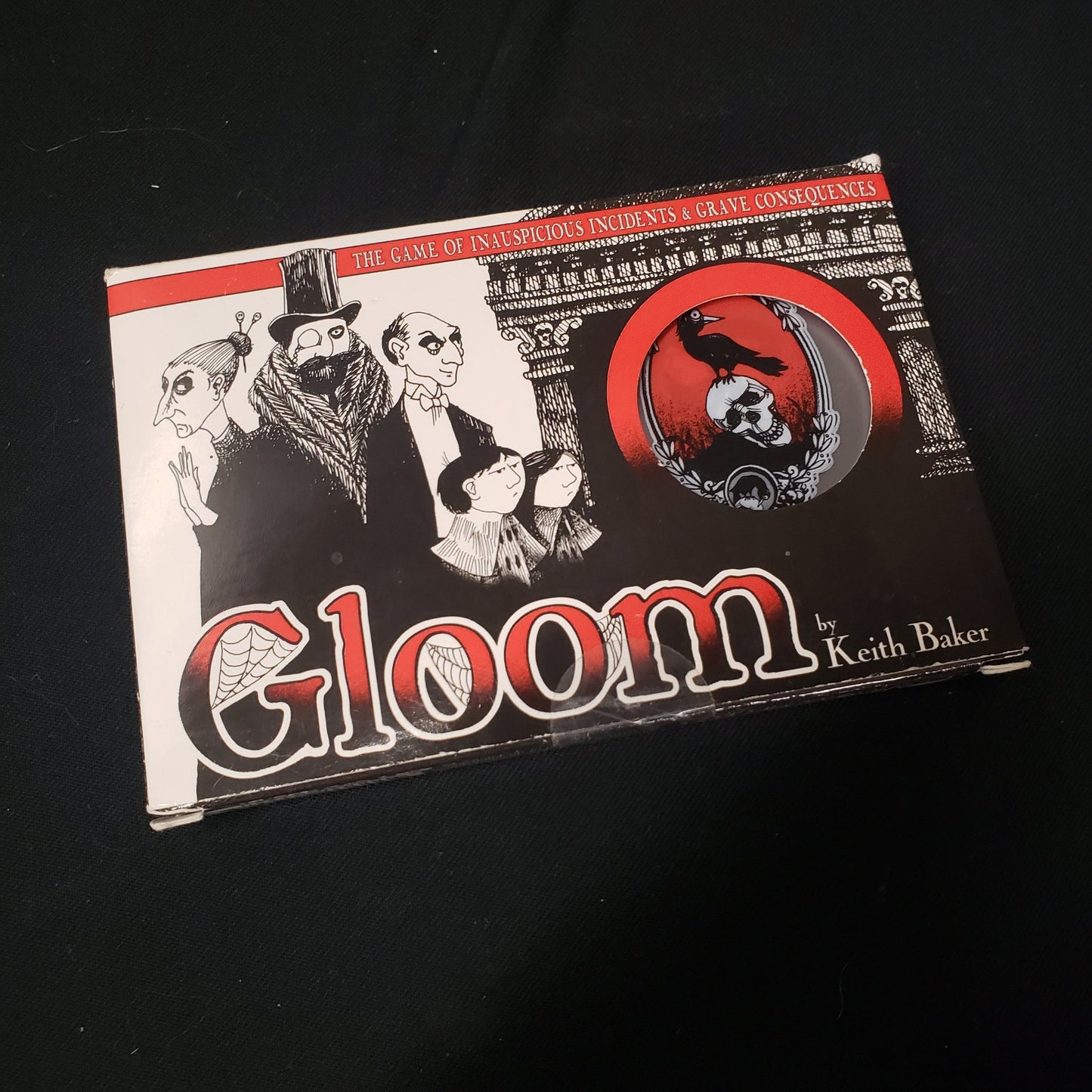 Image shows the front cover of the box of the Gloom card game