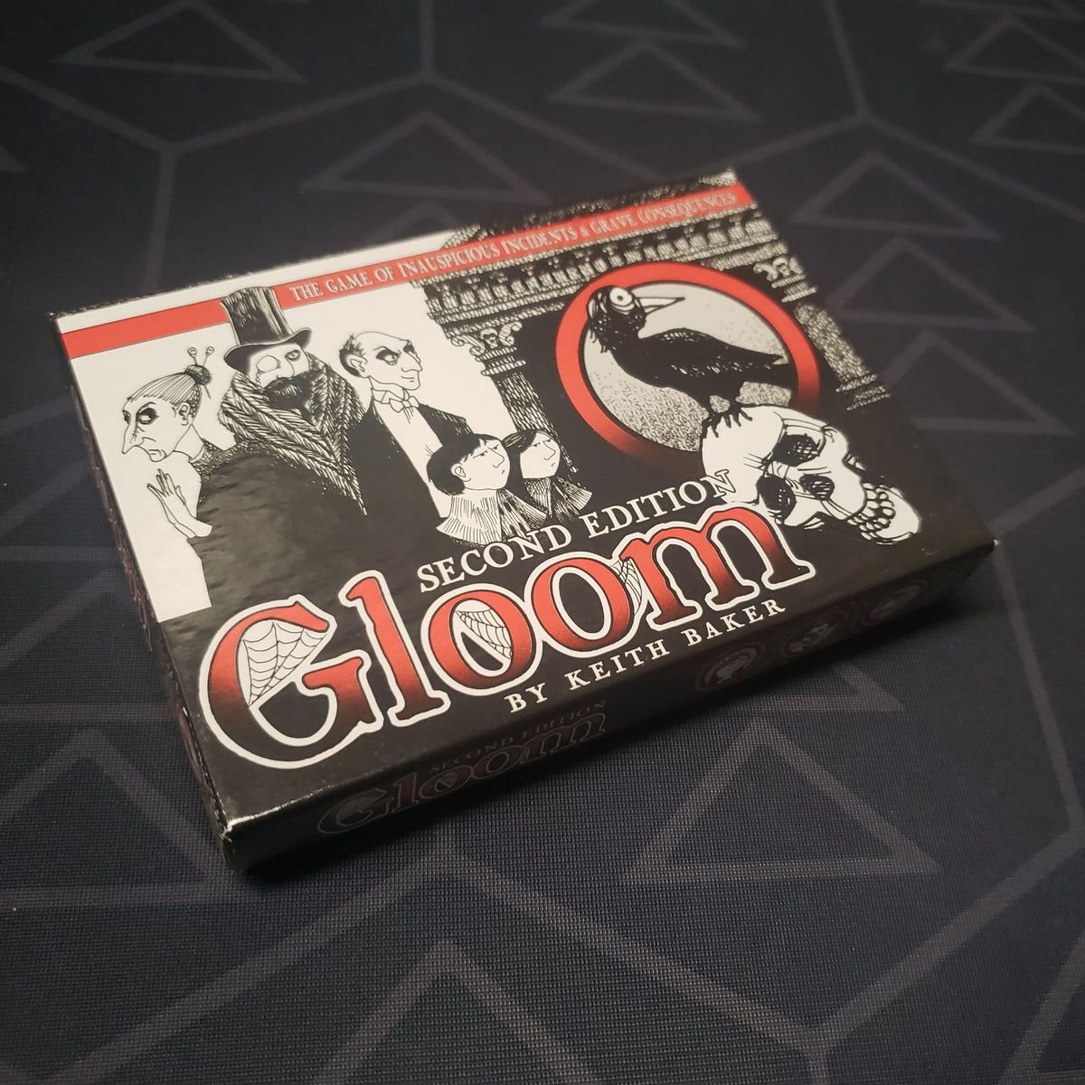 Image shows the front cover of the box of the Gloom card game