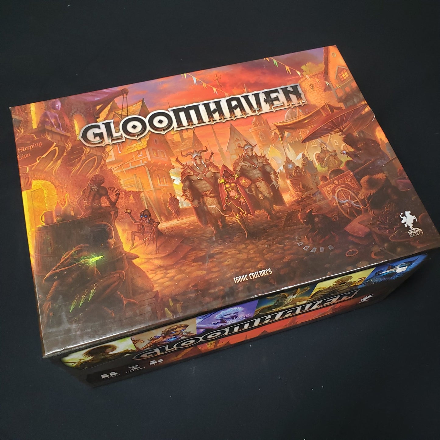 Image shows the front cover of the box of the Gloomhaven board game