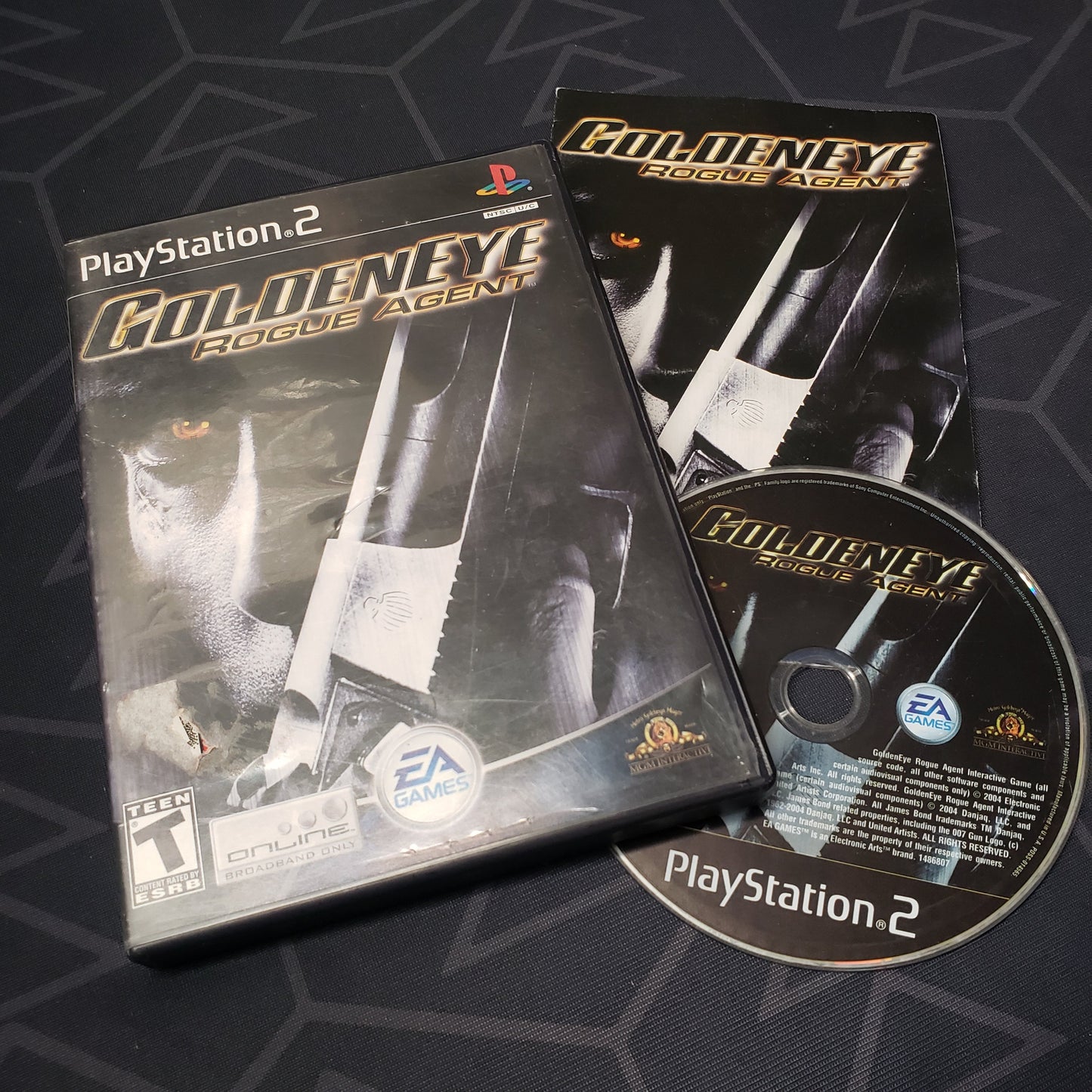 Image shows the case, manual and disc for the video game Goldeneye: Rogue Agent for Playstation 2