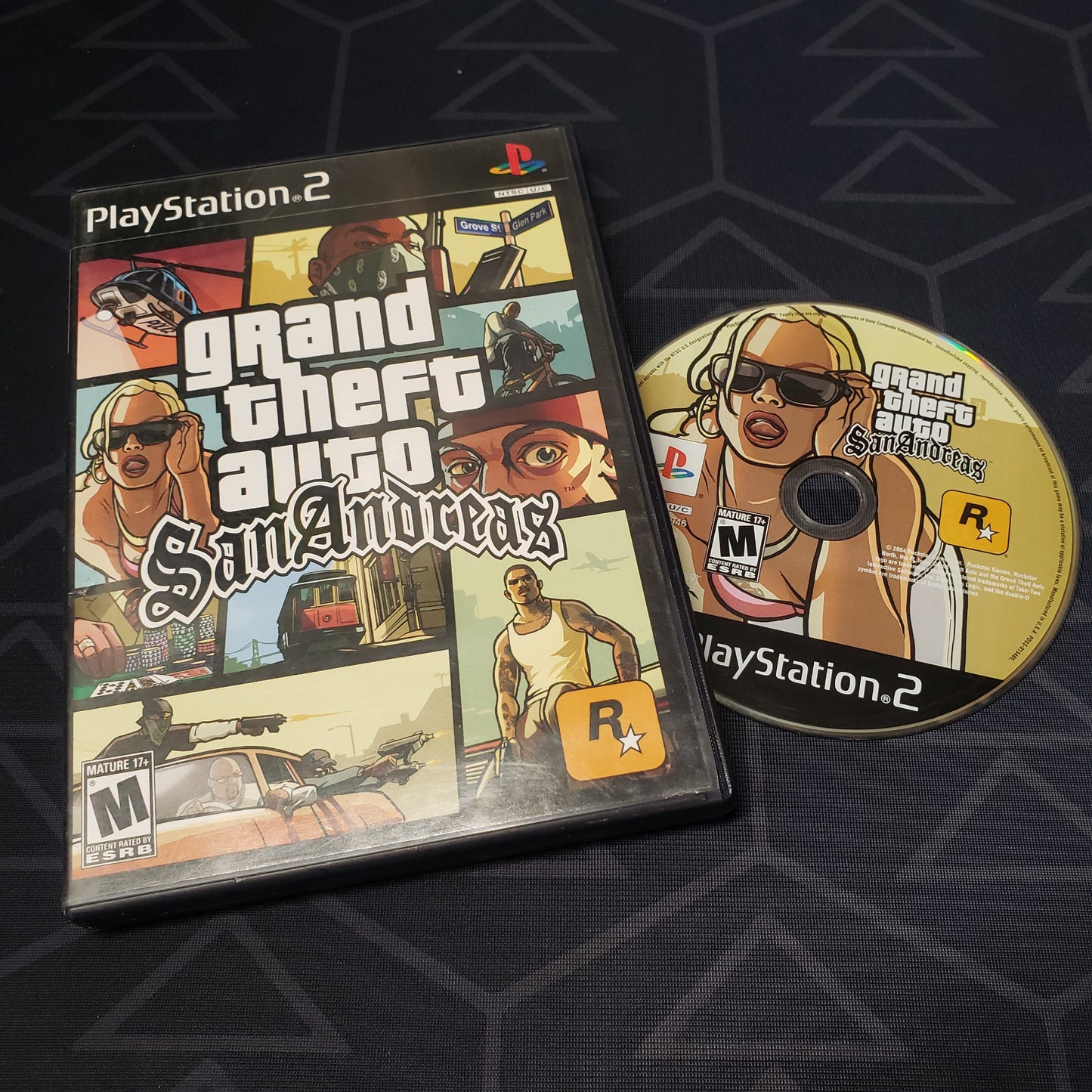 Image shows the case & disc for the video game Grand Theft Auto: San Andreas for Playstation 2