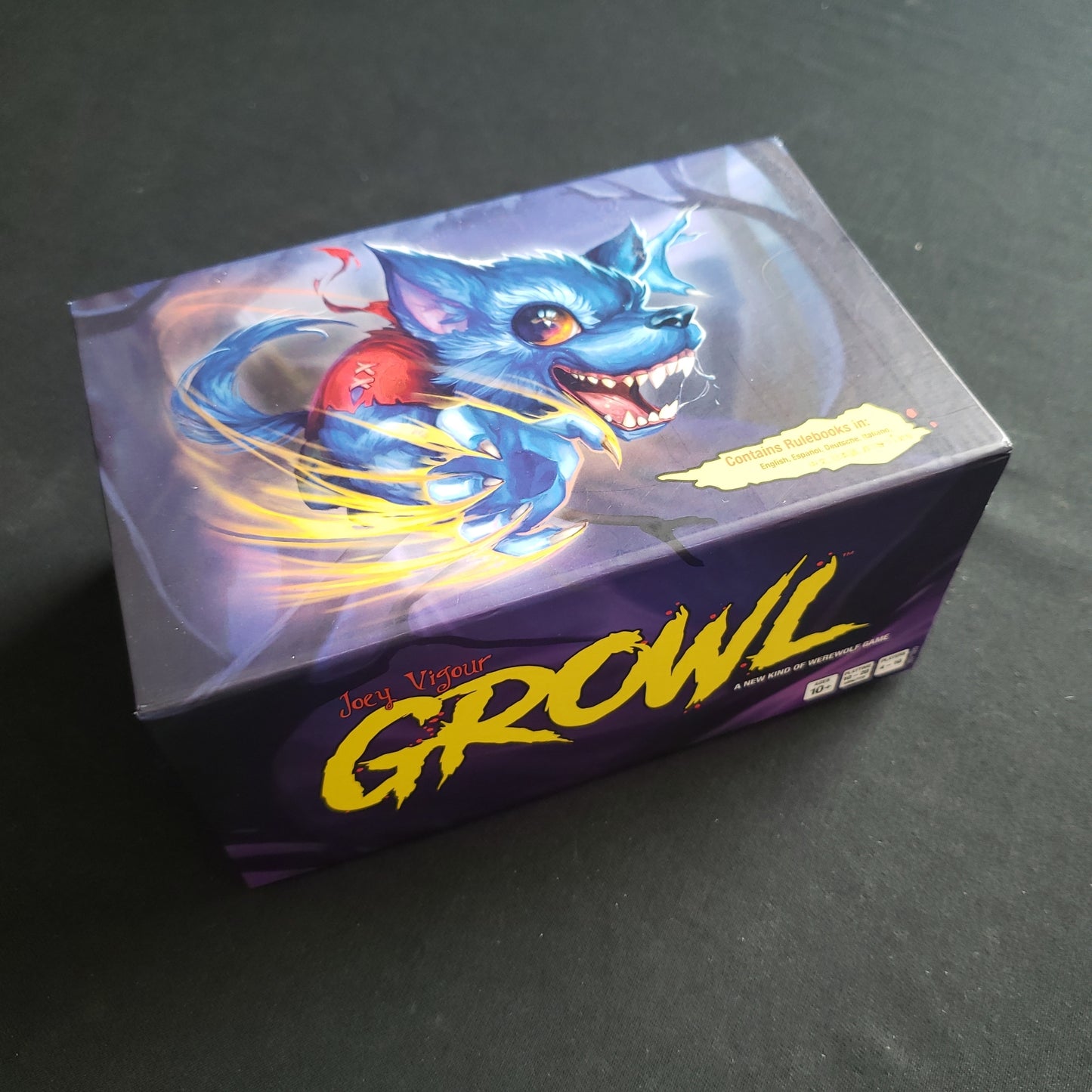 Image shows the front cover of the box of the GROWL card game