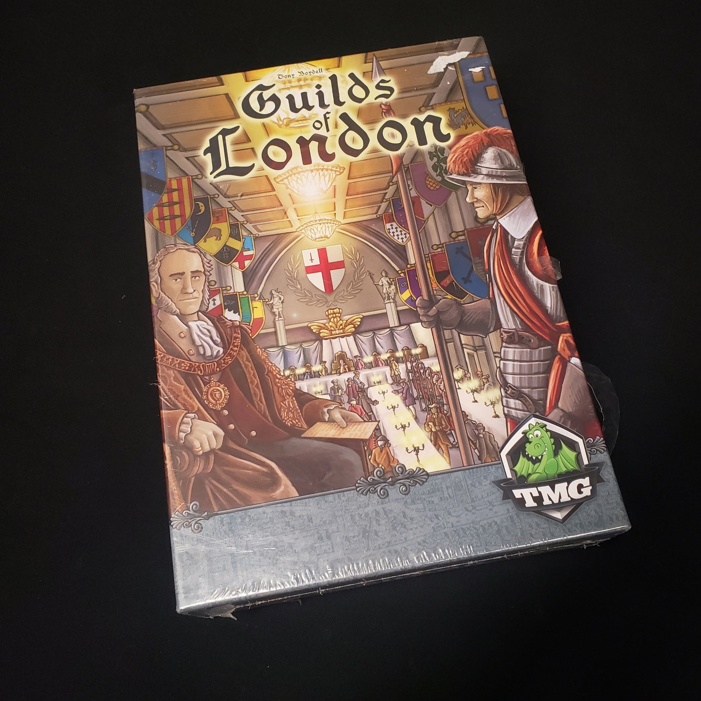 Image shows the front cover of the box of the Guilds of London board game