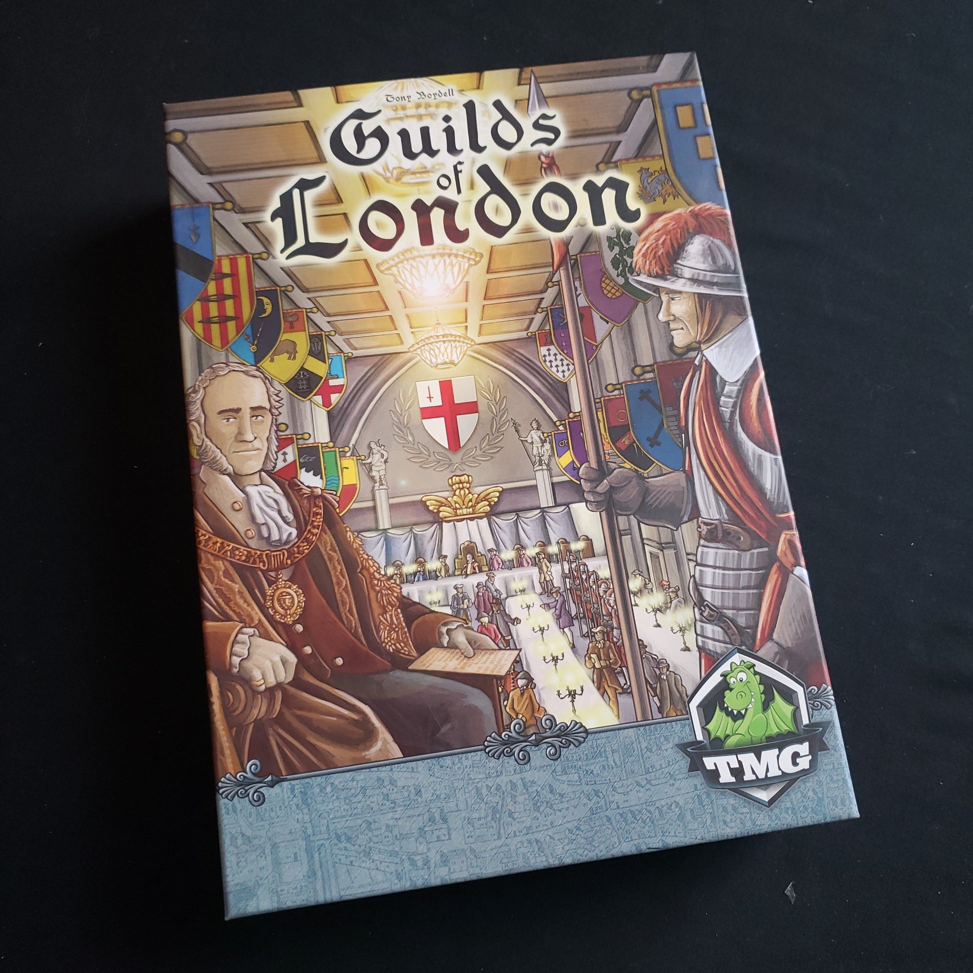 Image shows the front cover of the box of the Guilds of London board game