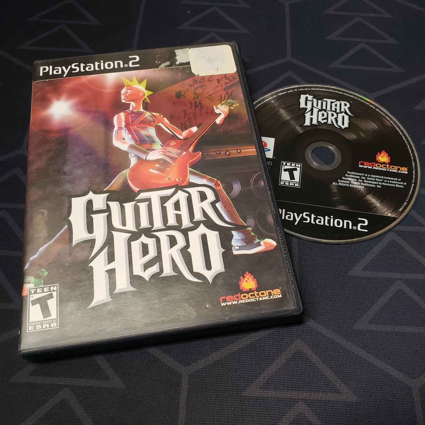 Image shows the case & disc for the video game Guitar Hero for Playstation 2