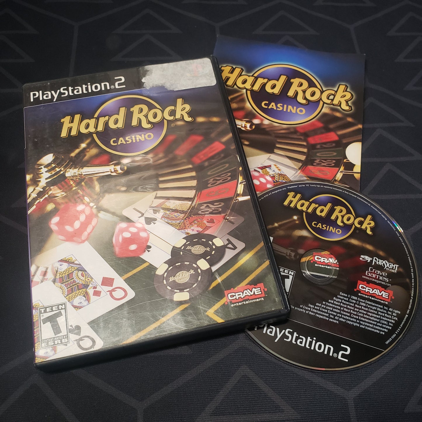 Image shows the case, manual and disc for the video game Hard Rock Casino for Playstation 2