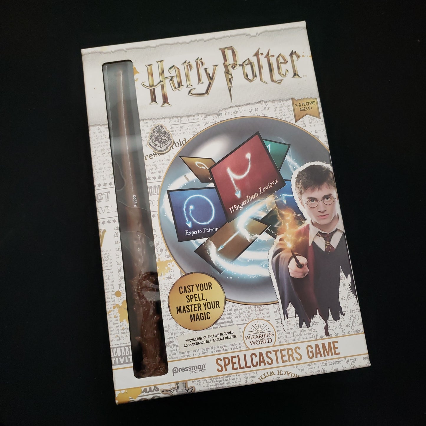 Image shows the front cover of the box of the Harry Potter Spellcasters board game