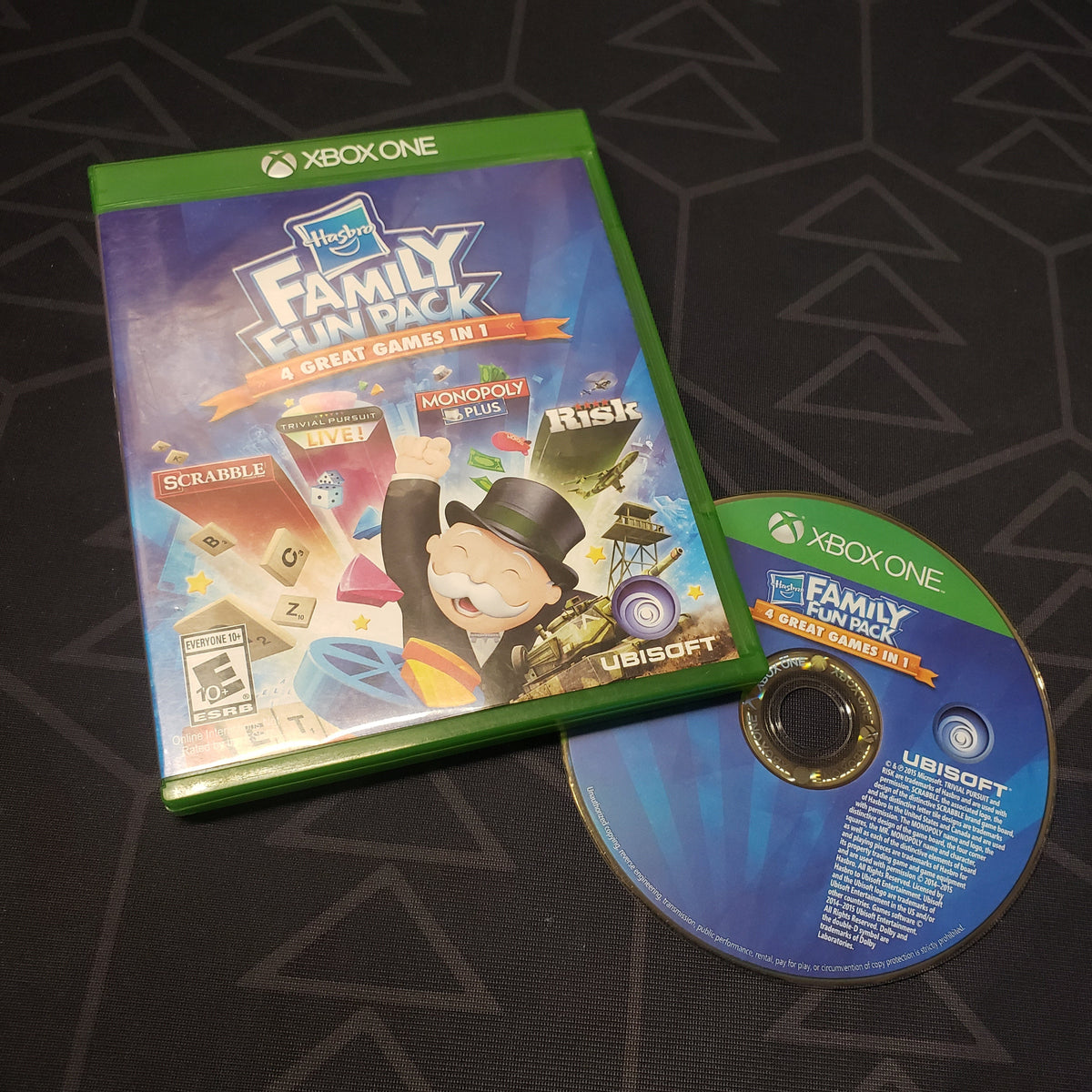 Image shows the case and disc for the video game Hasbro Family Fun Pack for Xbox One