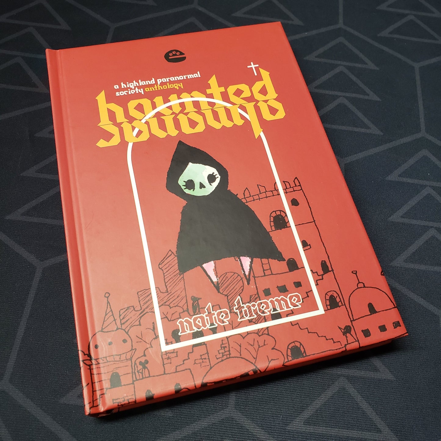 Image shows the front cover of the Haunted Almanac roleplaying game book