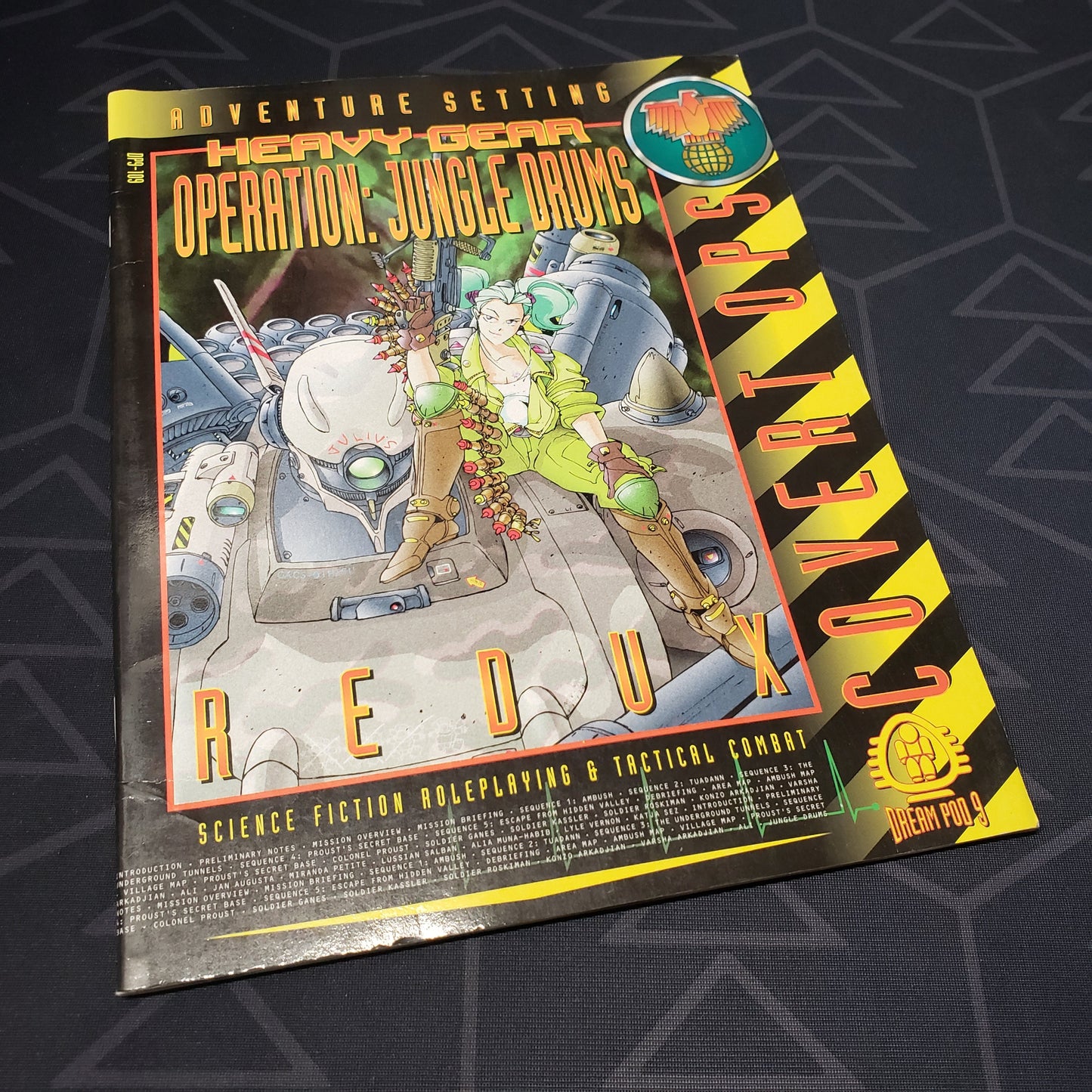 Image shows the front cover of the Operation Jungle Drums Redux book for the roleplaying game Heavy Gear