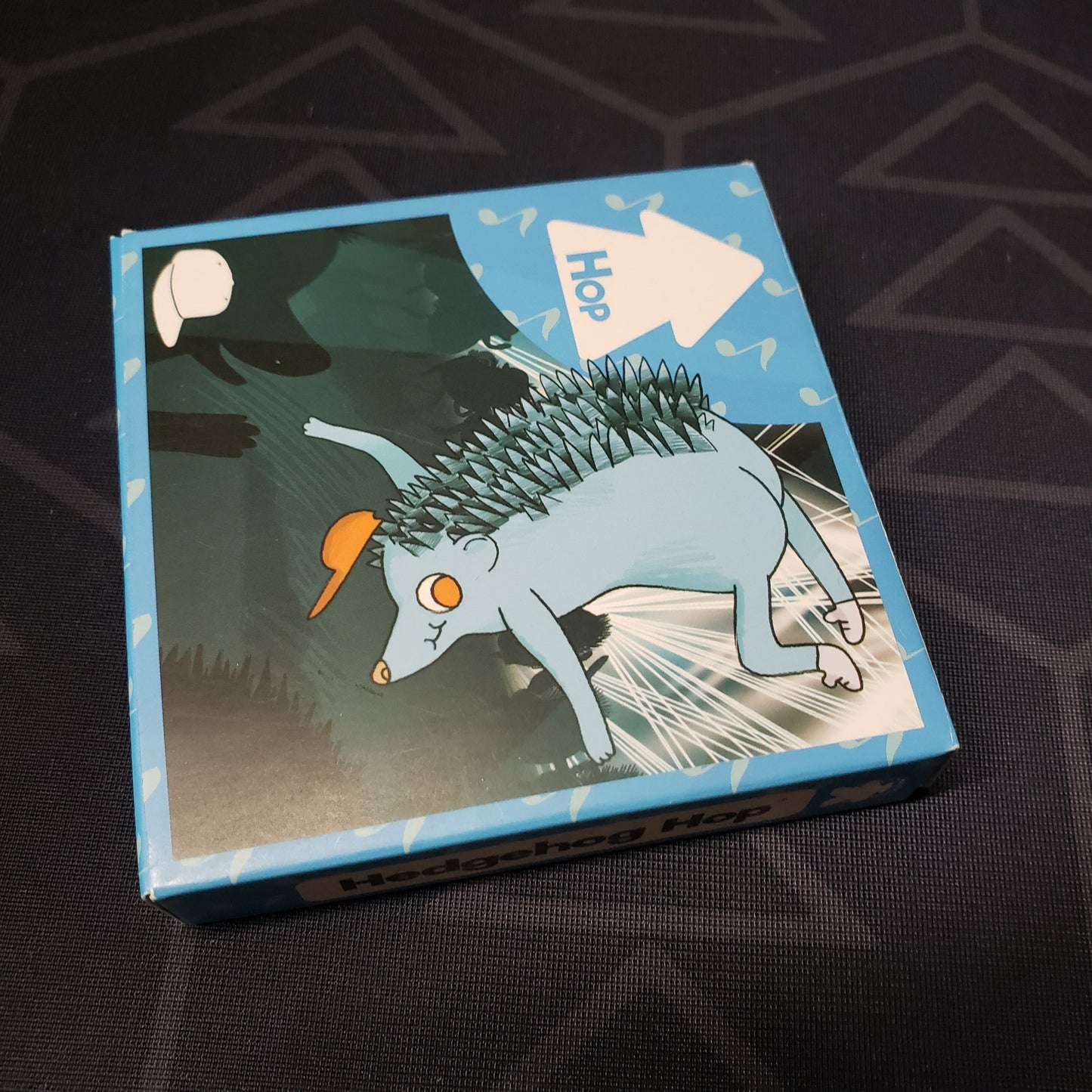 Image shows the front cover of the box for the Hedgehog Hop card game