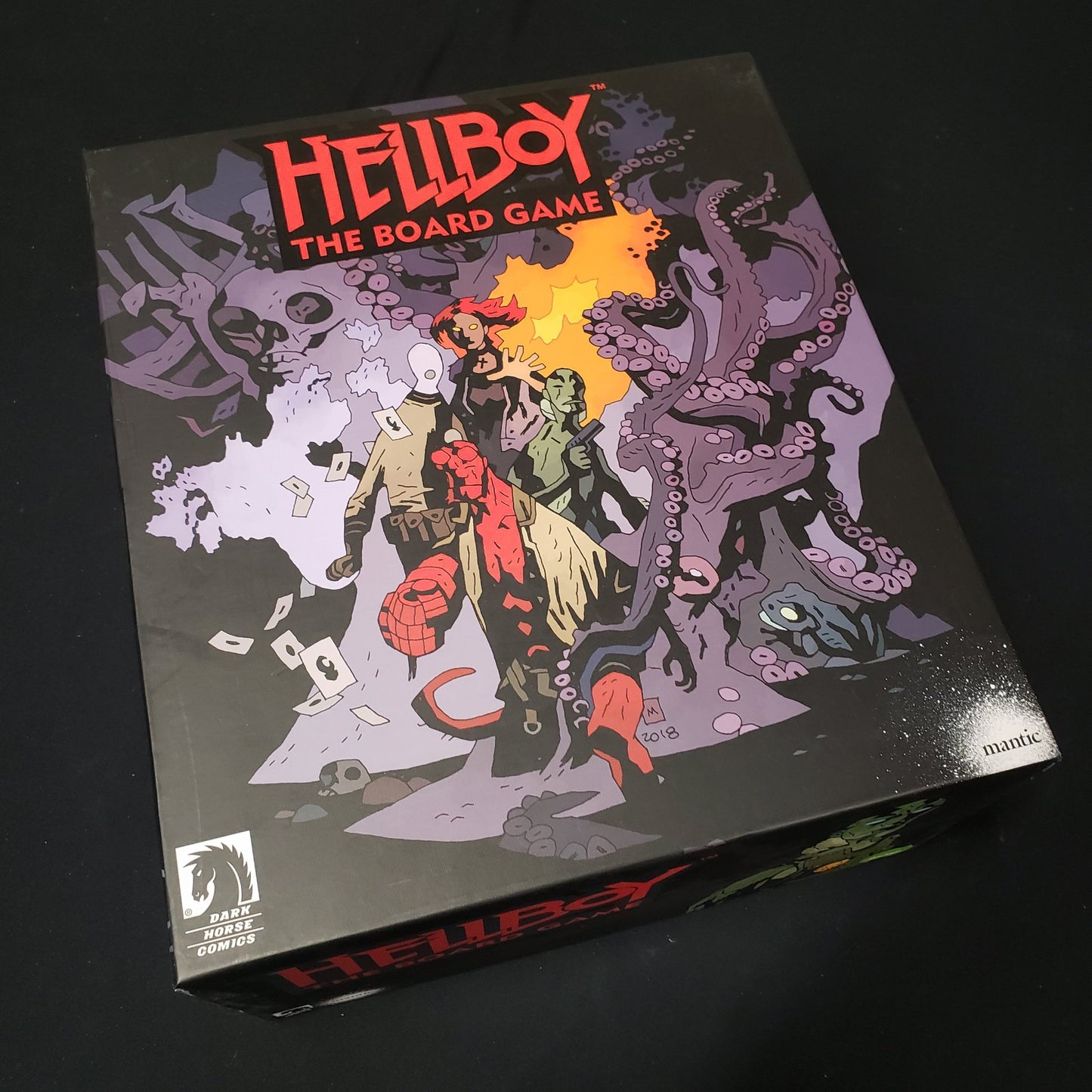Image shows the front cover of the box of the Deluxe Edition of Hellboy: The Board Game