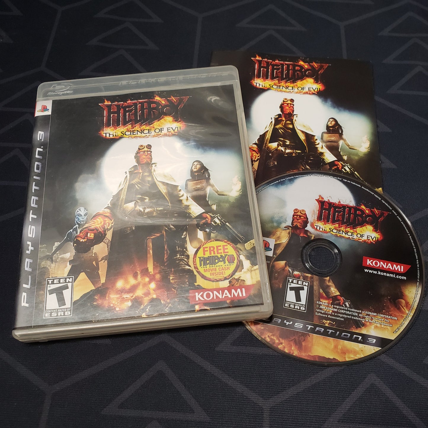 Image shows the case, manual and disc for the video game Hellboy: The Science of Evil for Playstation 3