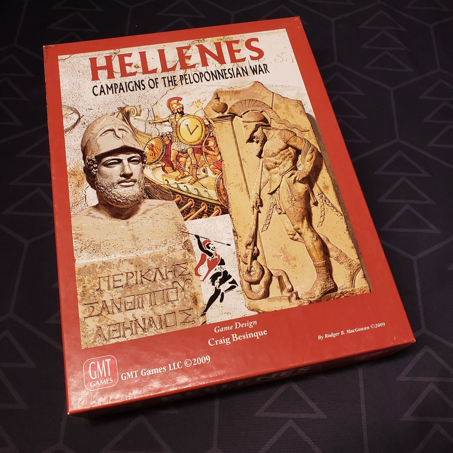 Image shows the front cover of the box for the Hellenes: Campaigns of the Peloponnesian War board game