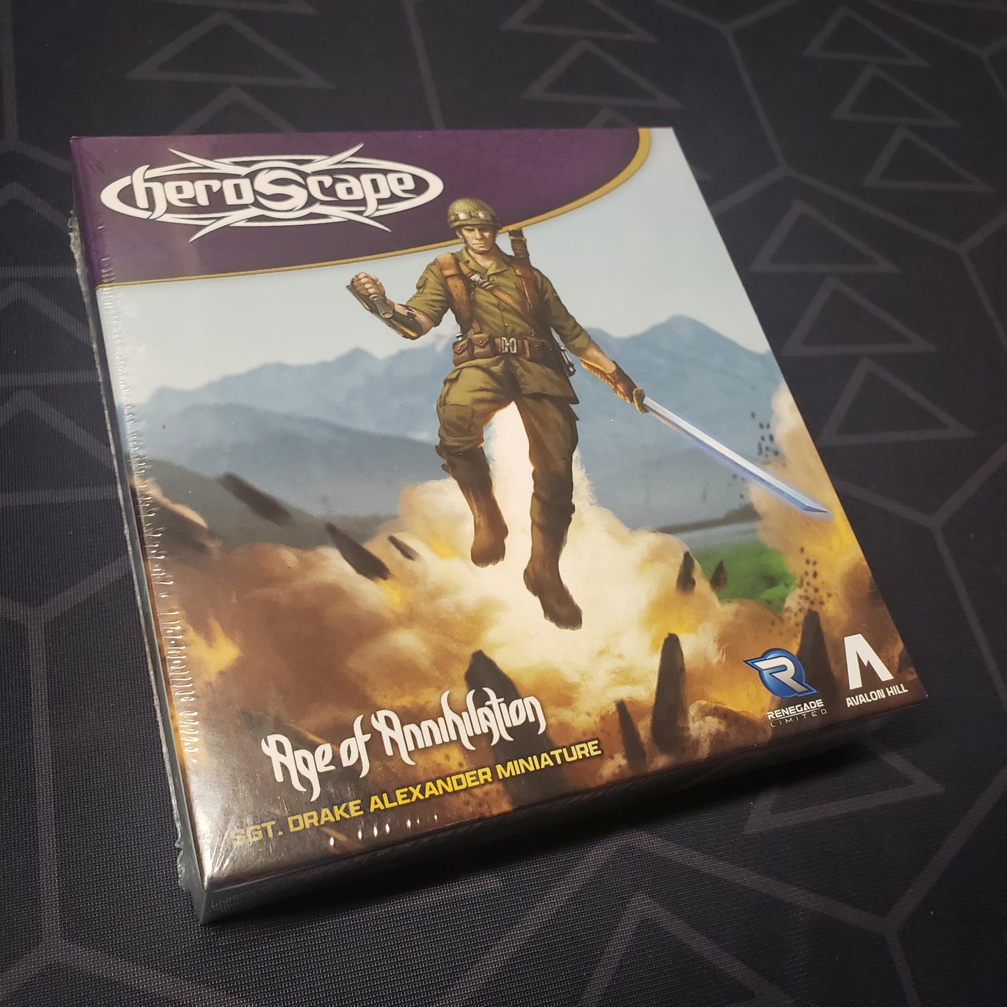 Image shows the front cover of the box of the Age of Annihilation: Sgt. Drake Alexander Miniature pack for the board game Heroscape