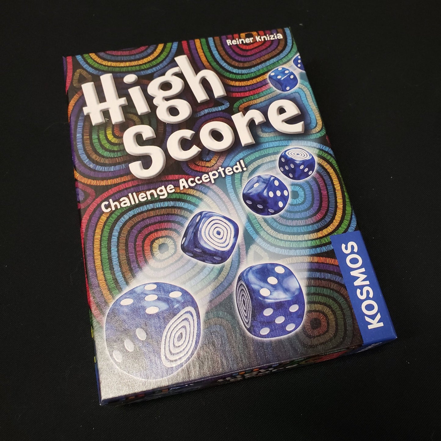 Image shows the front cover of the box of the High Score board game