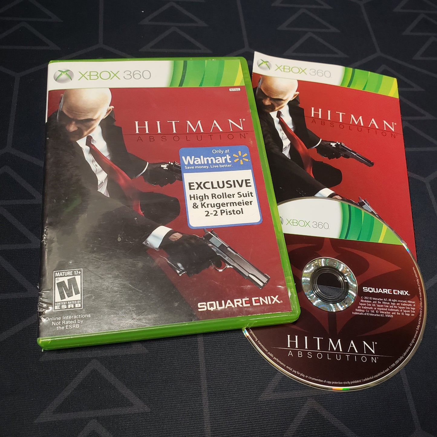 Image shows the case, manual & disc for the video game Hitman: Absolution for Xbox 360