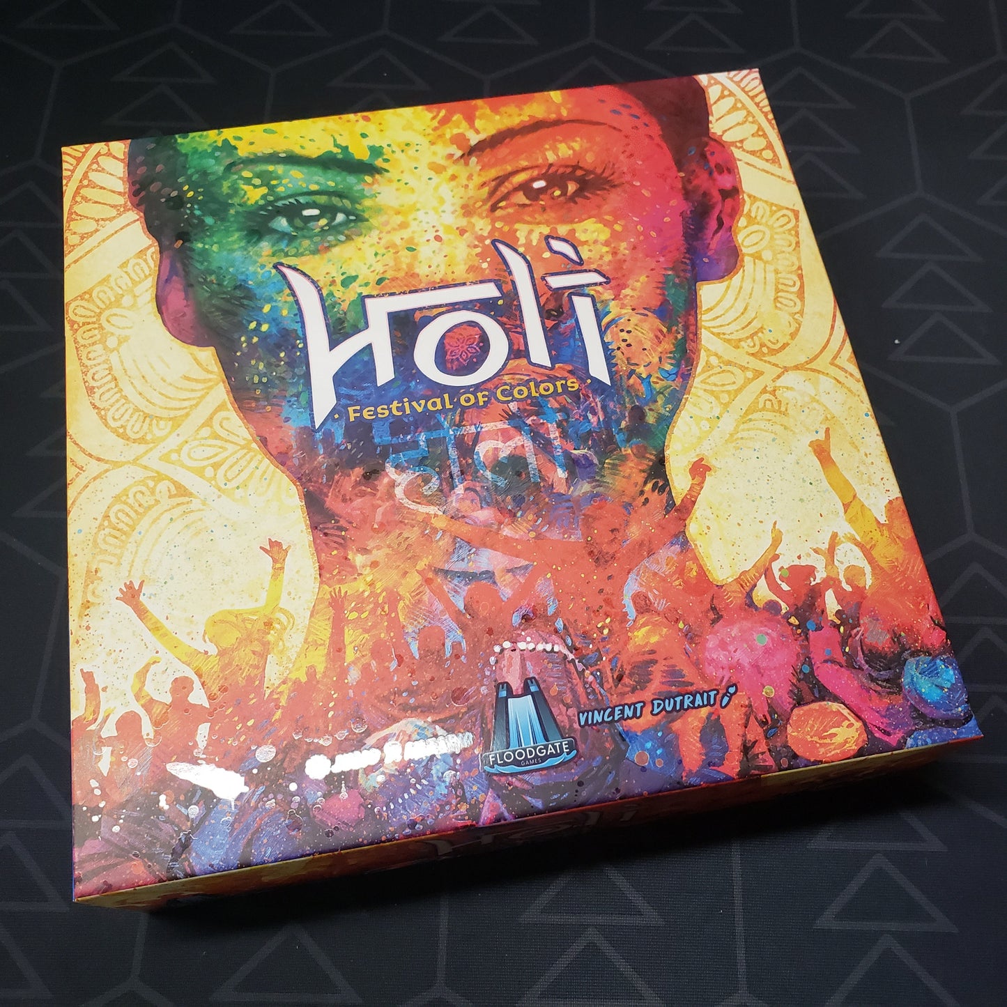 Image shows the front cover of the box of the Holi: Festival of Colors board game