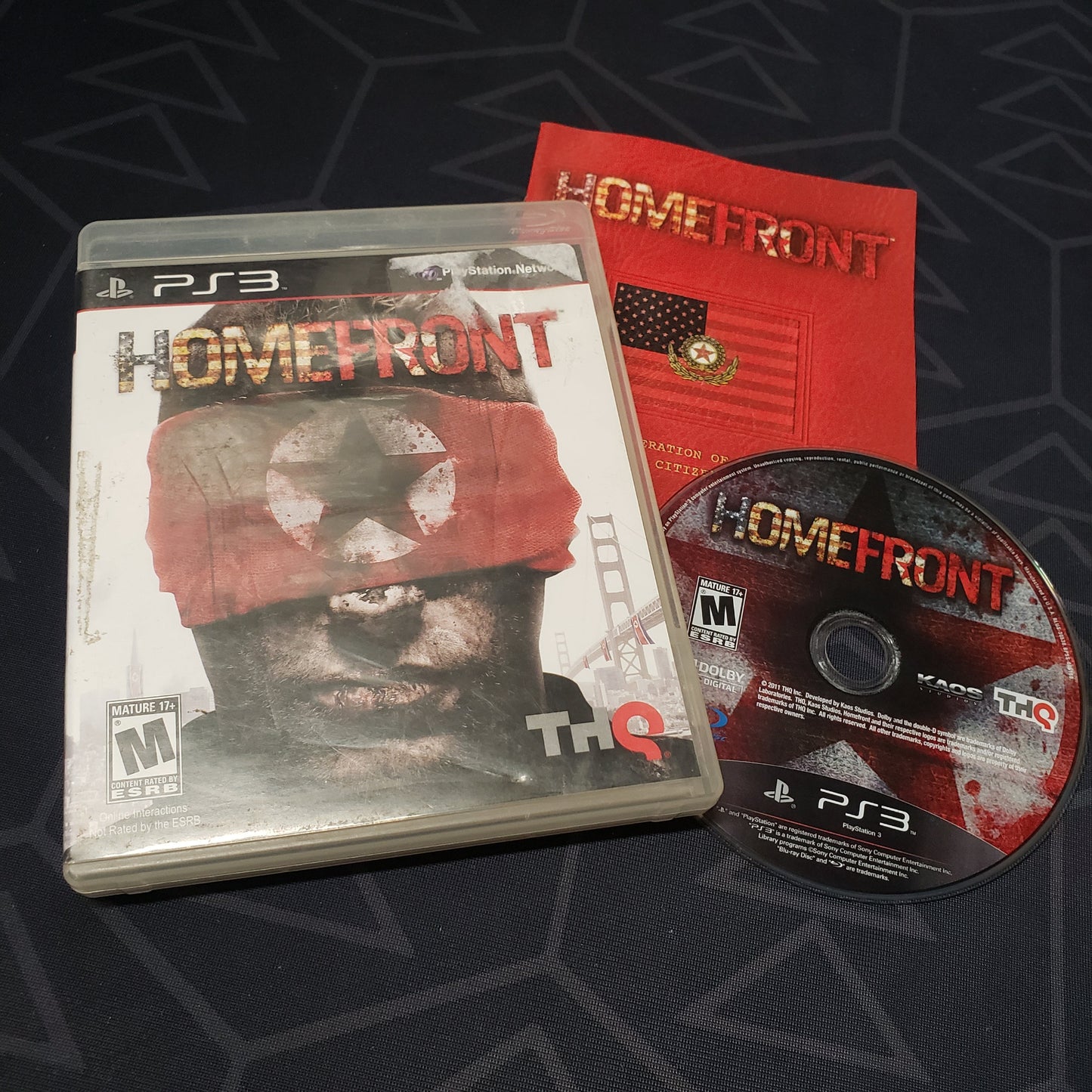 Image shows the case, manual and disc for the video game Homefront for Playstation 3