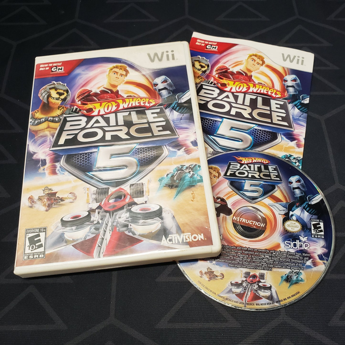 Image shows the case, manual and disc for the video game Hot Wheels: Battle Force 5 for Nintendo Wii