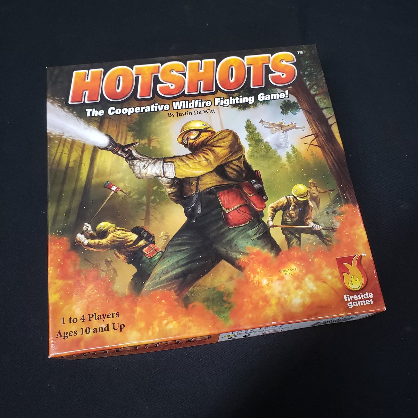 Image shows the front cover of the box of the Hotshots board game