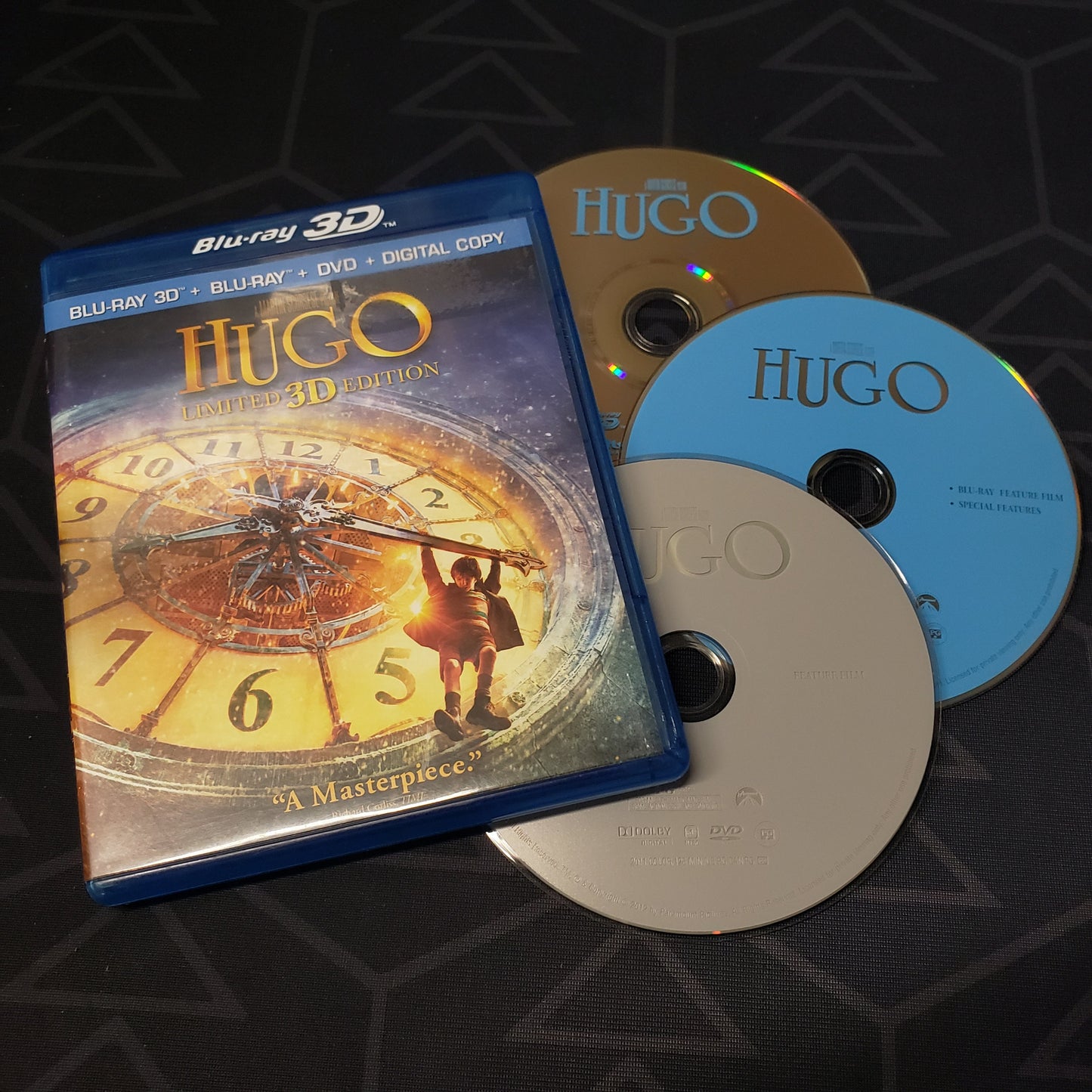 Image shows the case & three discs for the movie set of Hugo 3D on Blu-Ray