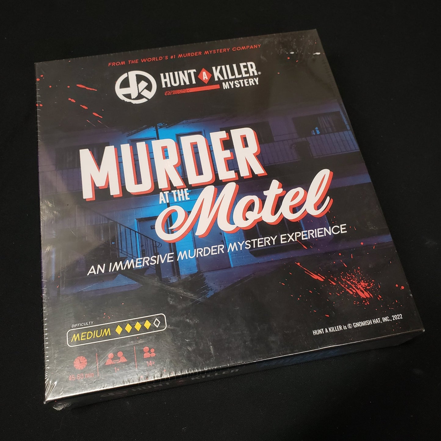 Image shows the front cover of the box of the Hunt A Killer: Murder at the Motel mystery game