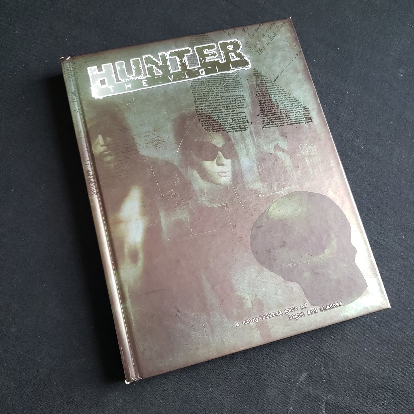 Image shows the front cover of the Core Rulebook for the Hunter: The Vigil roleplaying game