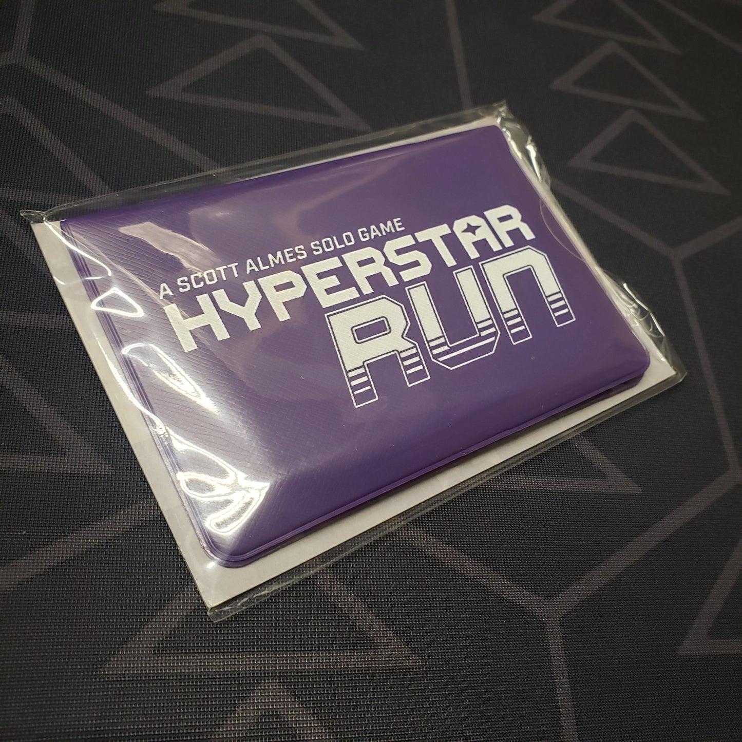 Image shows the front of the card wallet for the Hyperstar Run card game