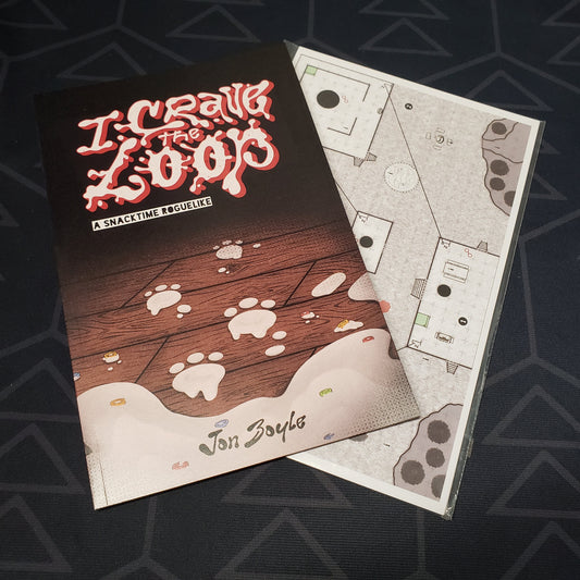 Image shows the front cover of the I Crave The Loop roleplaying game book, sitting on top of the map pack for the game