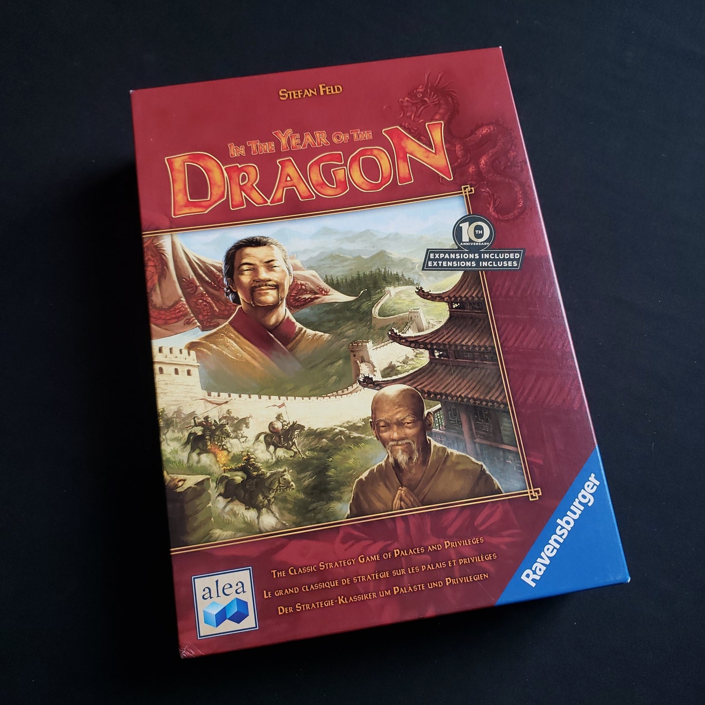 Image shows the front cover of the box of the In the Year of the Dragon board game
